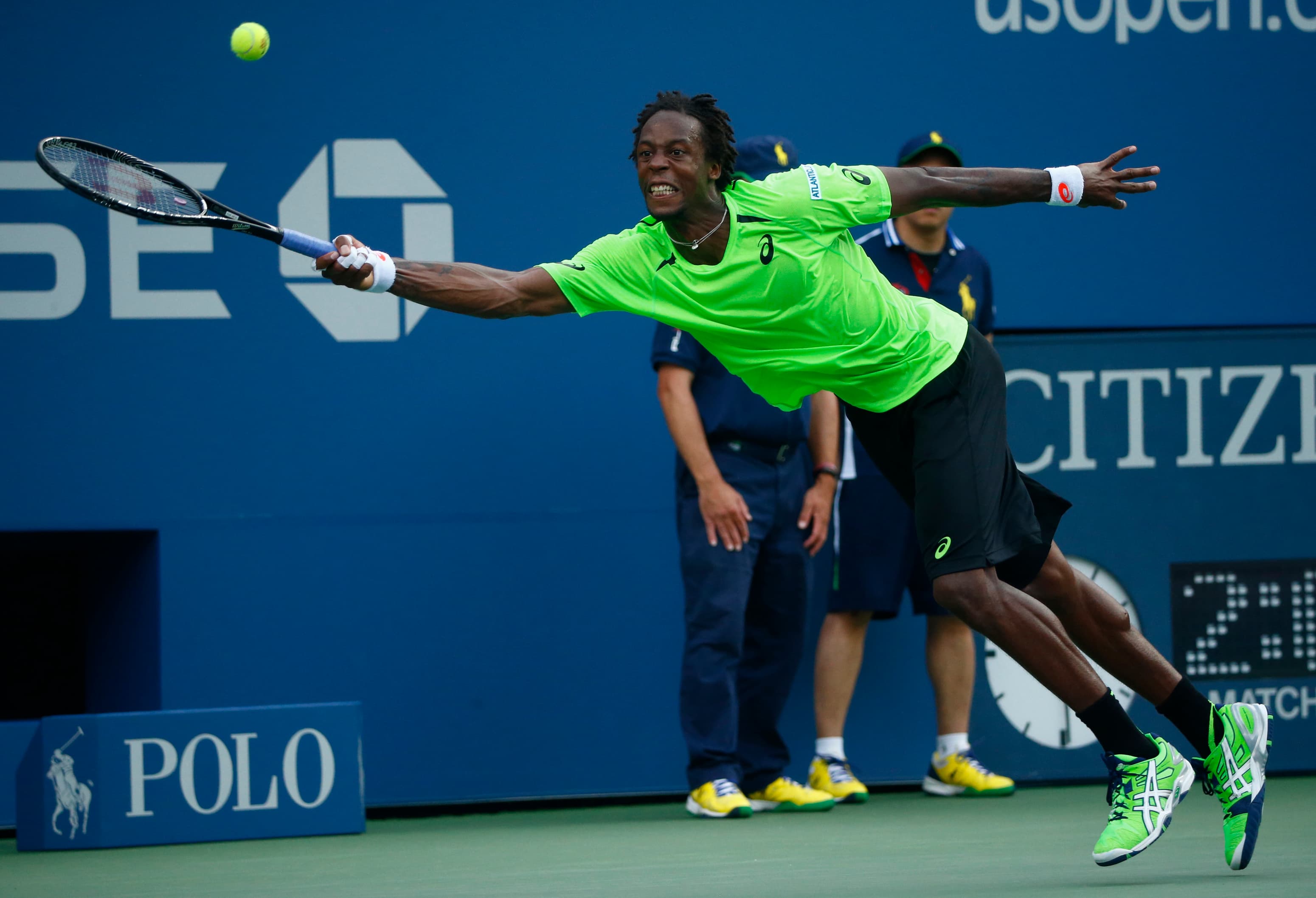 The "Sliderman," Gael Monfils, in action against Grigor Dimitrov of Bulgaria during their fourth round match at the US Open on Tuesday.