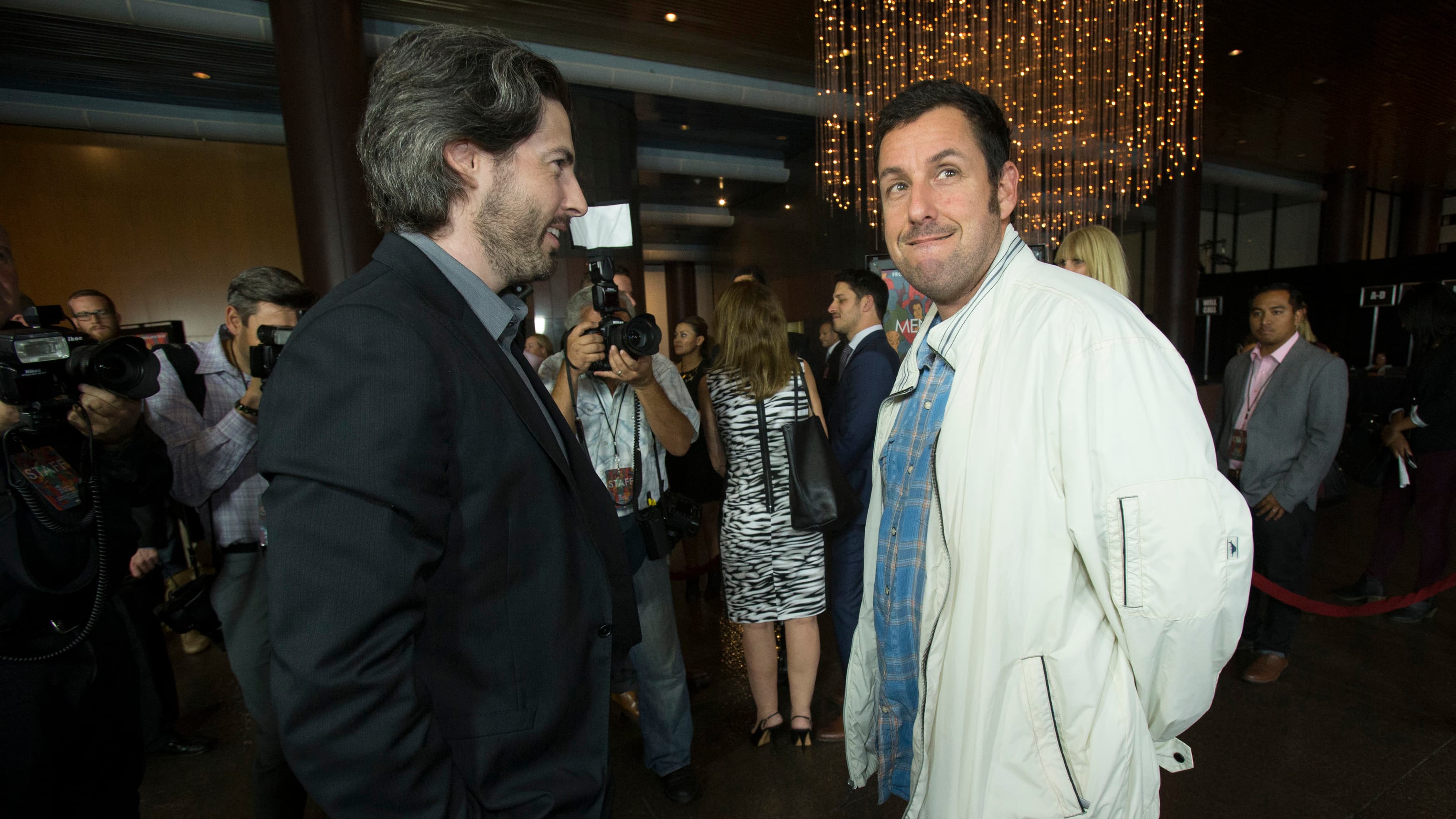 Adam Sandler with direction Jason Reitman at the premiere of thier movie, "Men, Women & Children," Los Angeles on September 30, 2014.