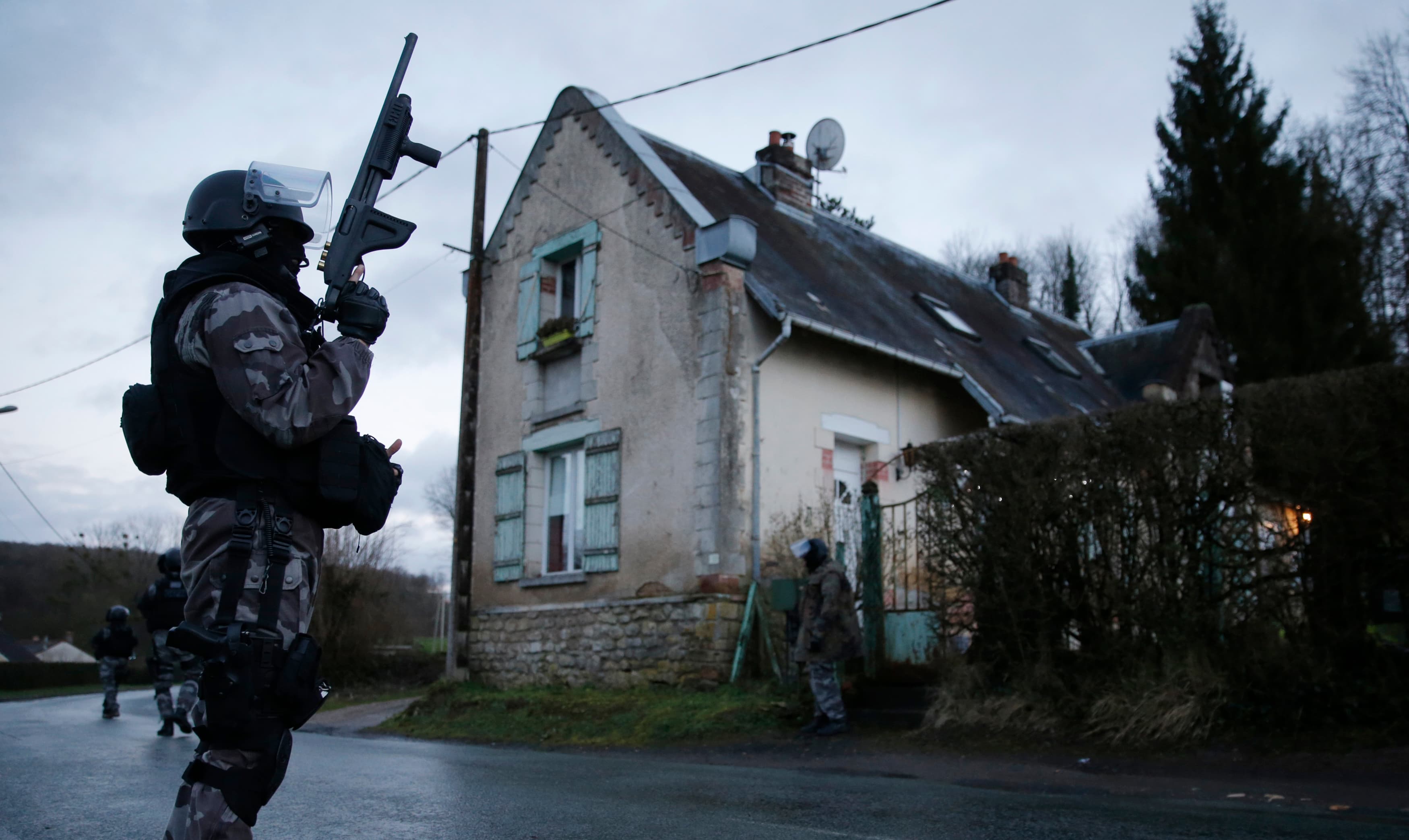 Members of the French GIPN intervention police forces secure a neighbourhood in Corcy, northeast of Paris.