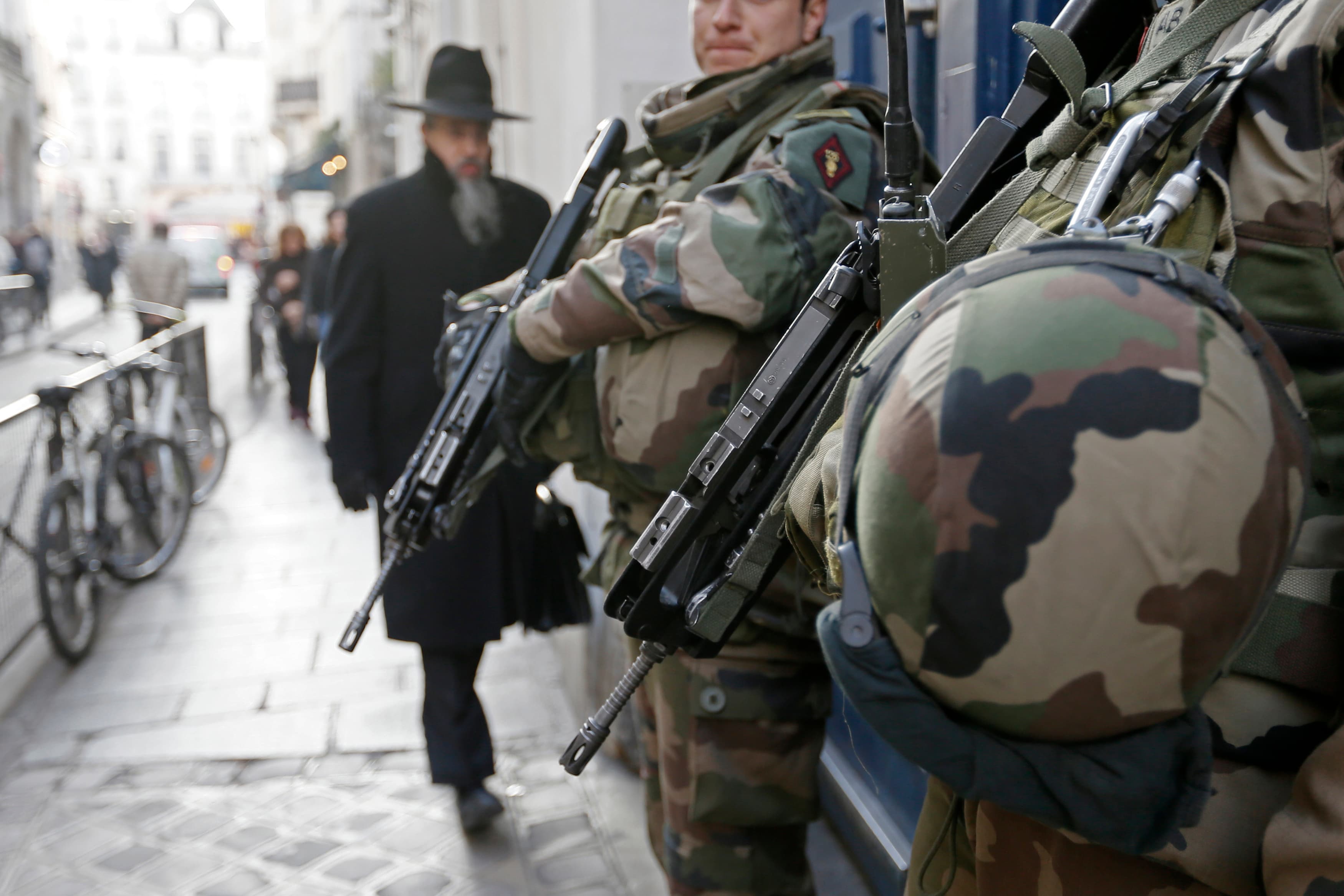 rench soldiers patrol the street in a Jewish neighbourhood near a religious school and a synagogue as part of the highest level of "Vigipirate" security plan after the Islamist attacks in Paris January 20, 2015.