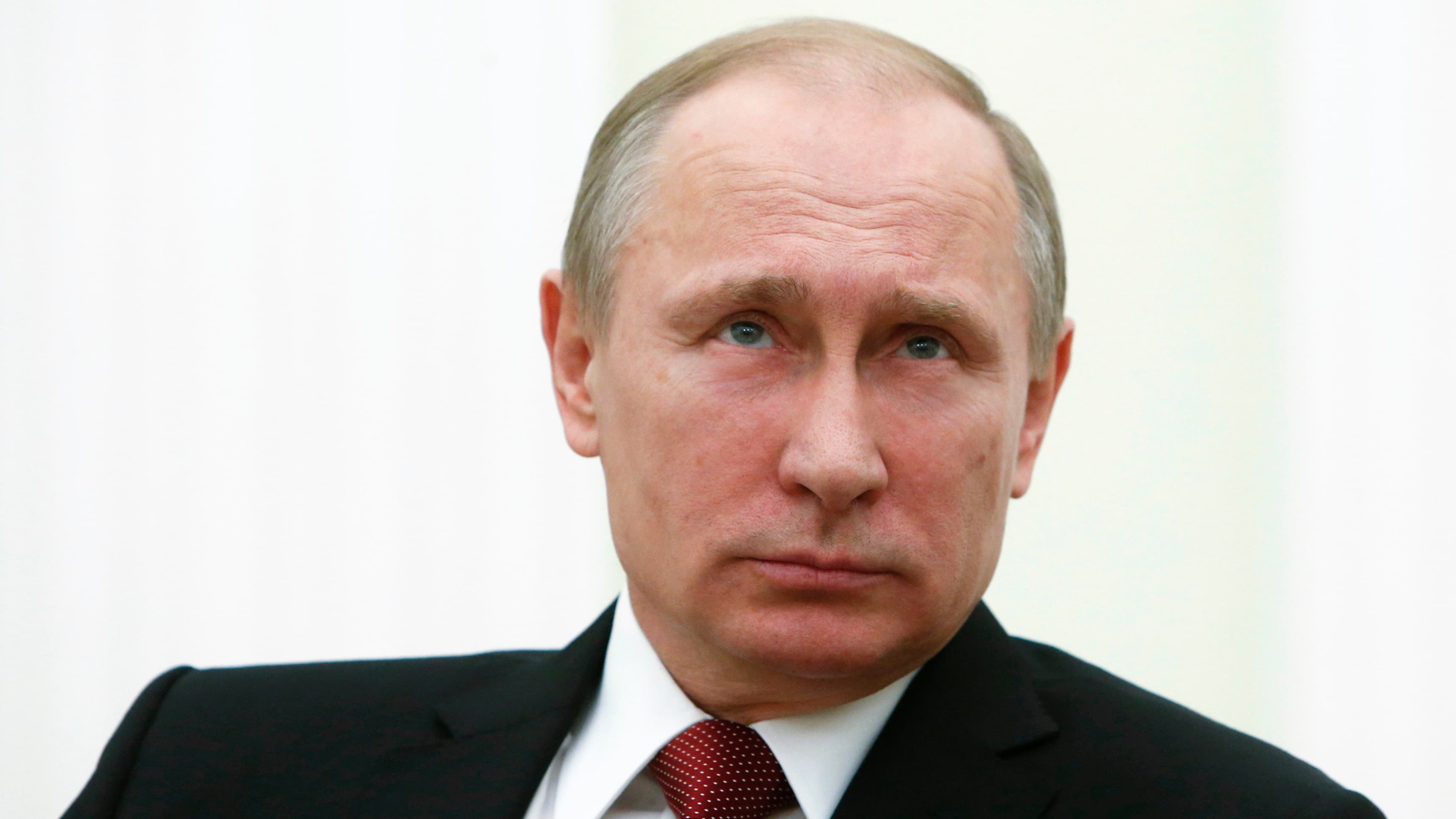 Russian President Vladimir Putin attends a meeting with Italian Prime Minister Matteo Renzi at the Kremlin in Moscow, March 5, 2015.