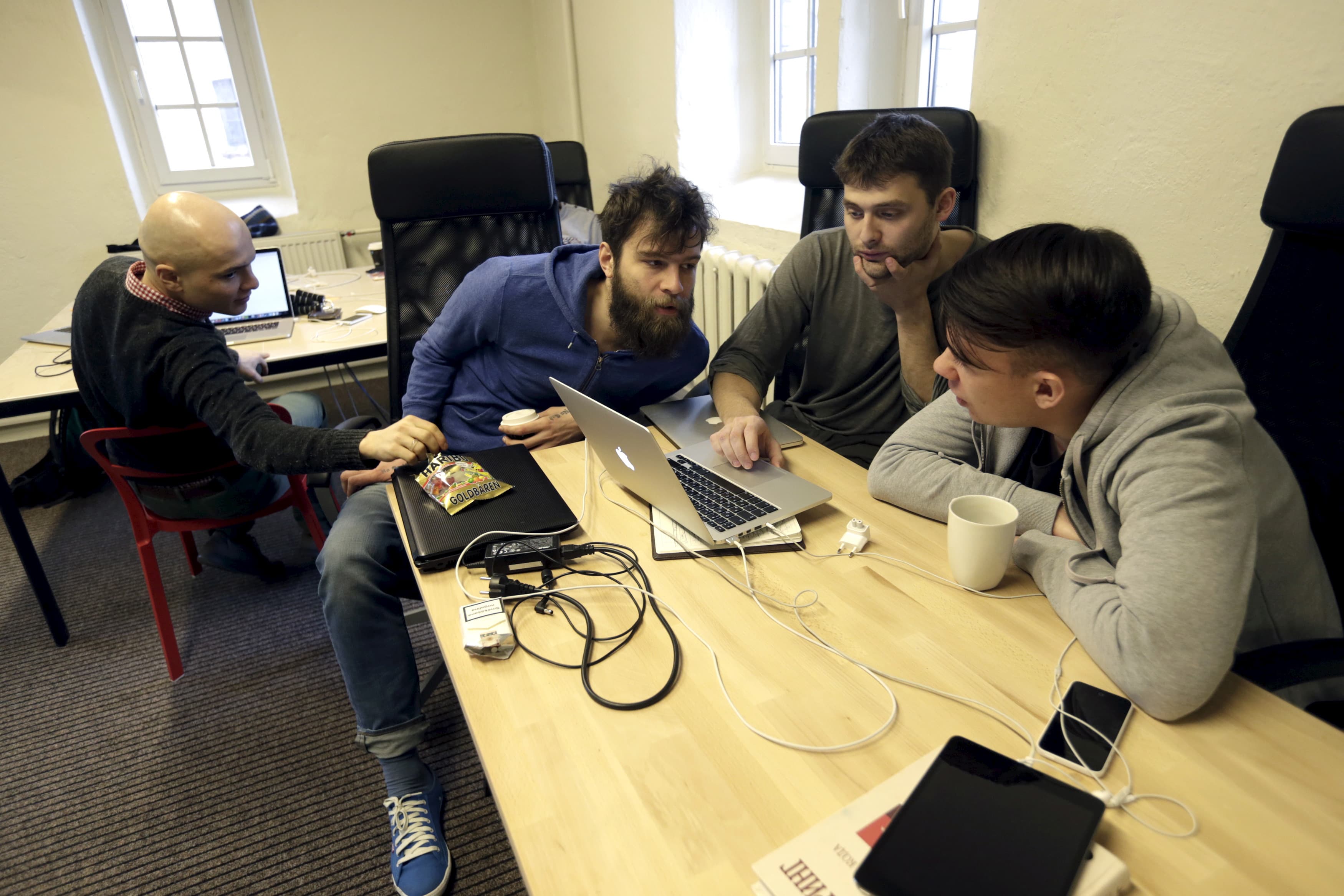 Journalists work in the independent, Russia-focused, media start-up Meduza office in Riga March 30, 2015.