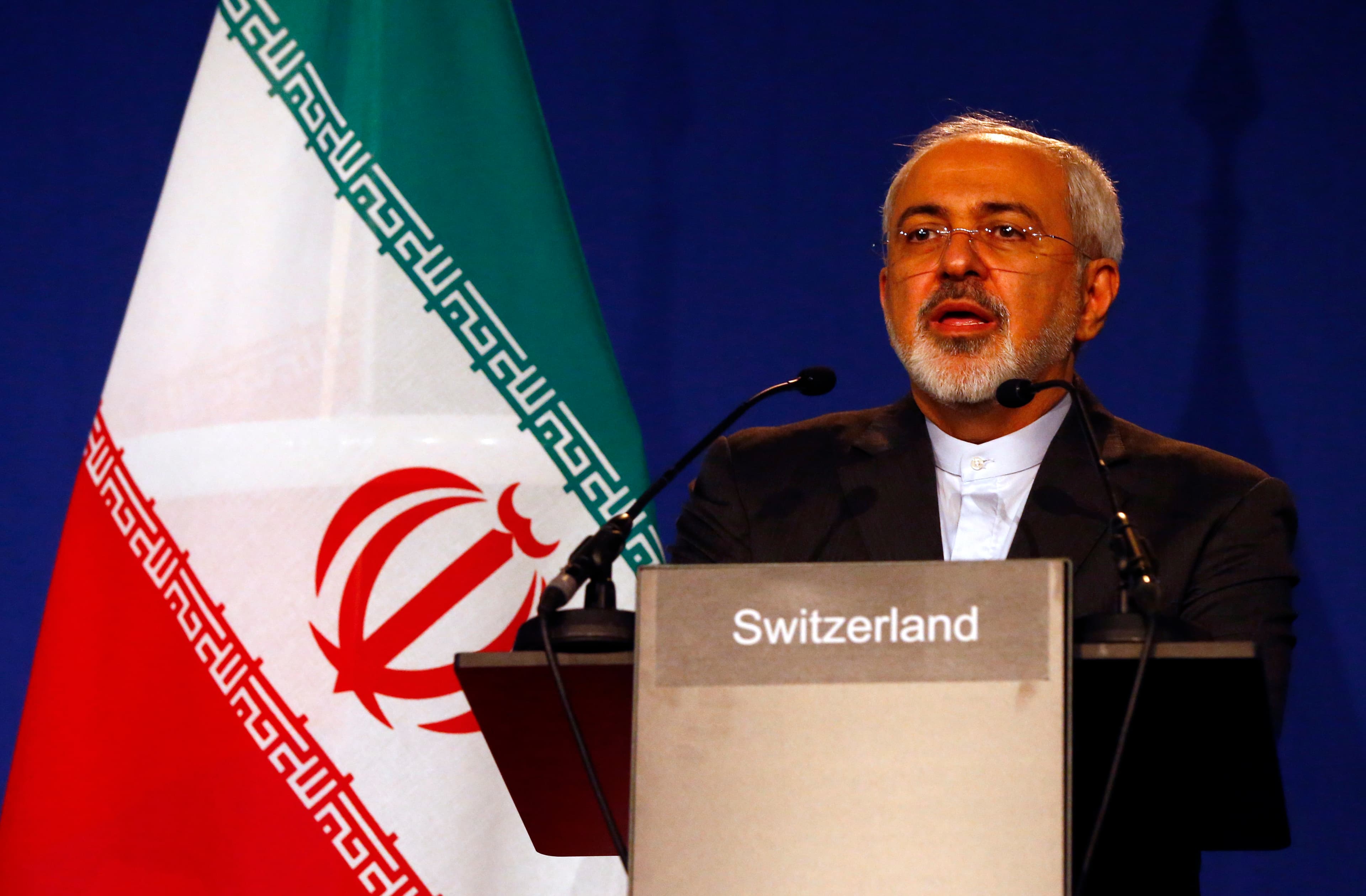 Iranian Foreign Minister Javad Zarif addresses reporters regarding his nation's nuclear deal during a joint statement with EU foreign policy chief Federica Mogherini in Lausanne, Switzerland, on April 2, 2015.