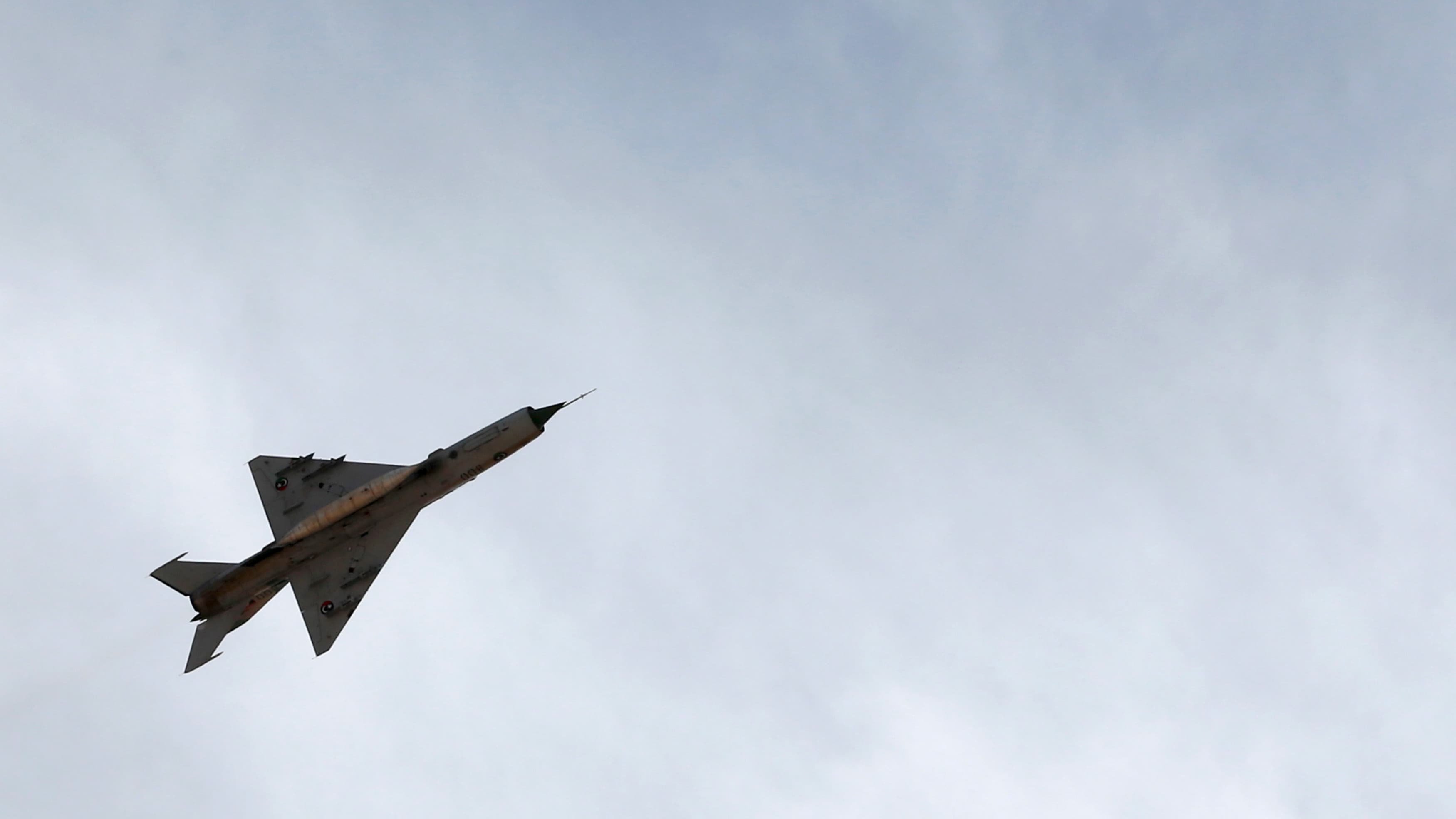 An antiquated warplane belonging to Libyan pro-government forces prepares to attack ISIS-linked rebels in Benghazi. Italy and Egypt are pushing for the US-led anti-ISIS coalition to join the fight in Libya.