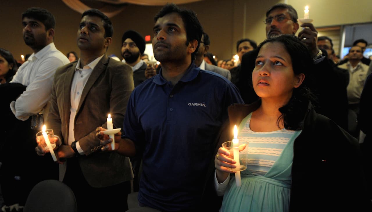 A survivor of the Olathe shooting at a vigil