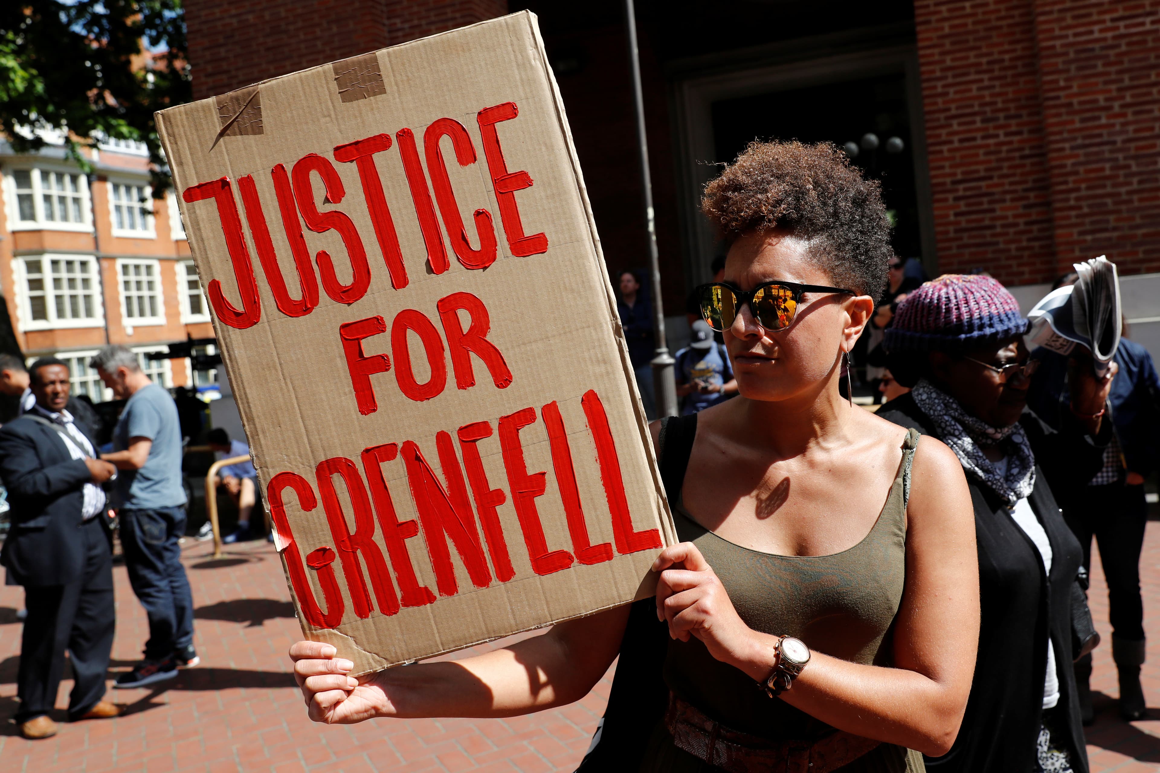 A protester outside Kensington and Chelsea Town Hall. Anger has been growing over the authorities' handling of the tragedy at Grenfell Tower.