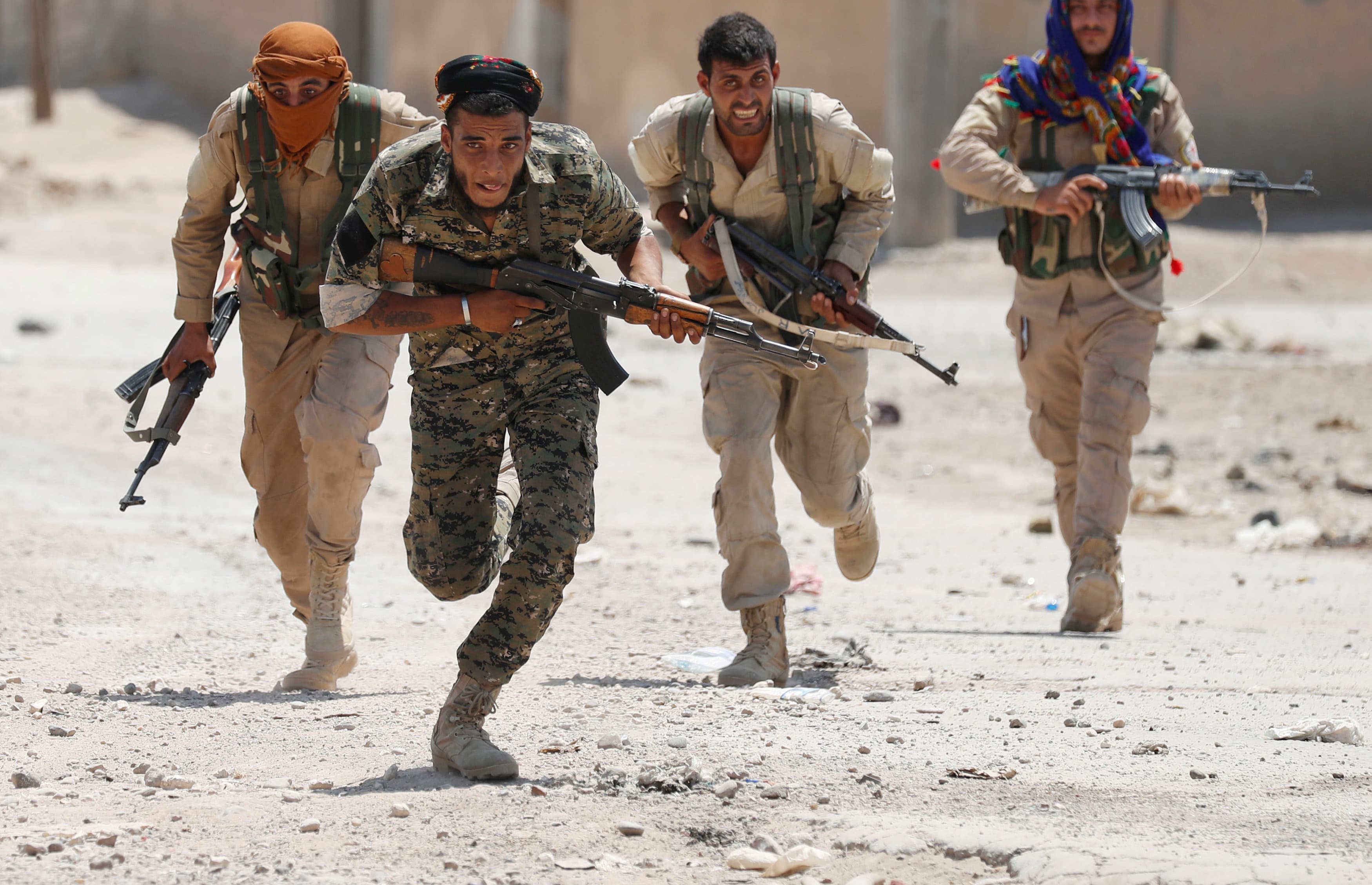 Fighting continues in Syria, where Kurdish troops from the People's Protection Units are facing down ISIS militants in Raqqa, Syria.