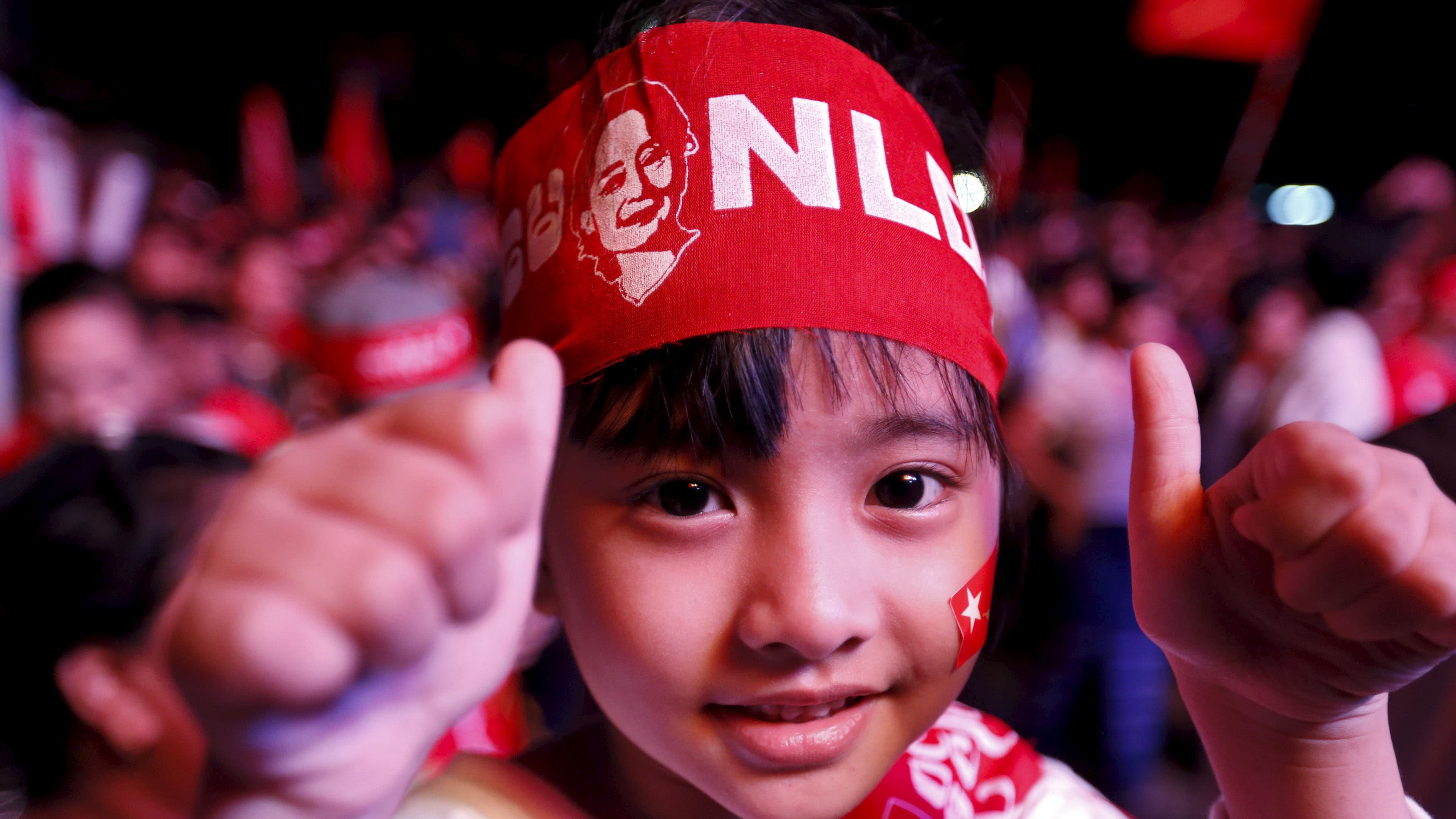 Supporters of Myanmar's pro-democracy figurehead Aung San Suu Kyi gather outside National League for Democracy headquarters (NLD) in Yangon, Myanmar, November 9, 2015.
