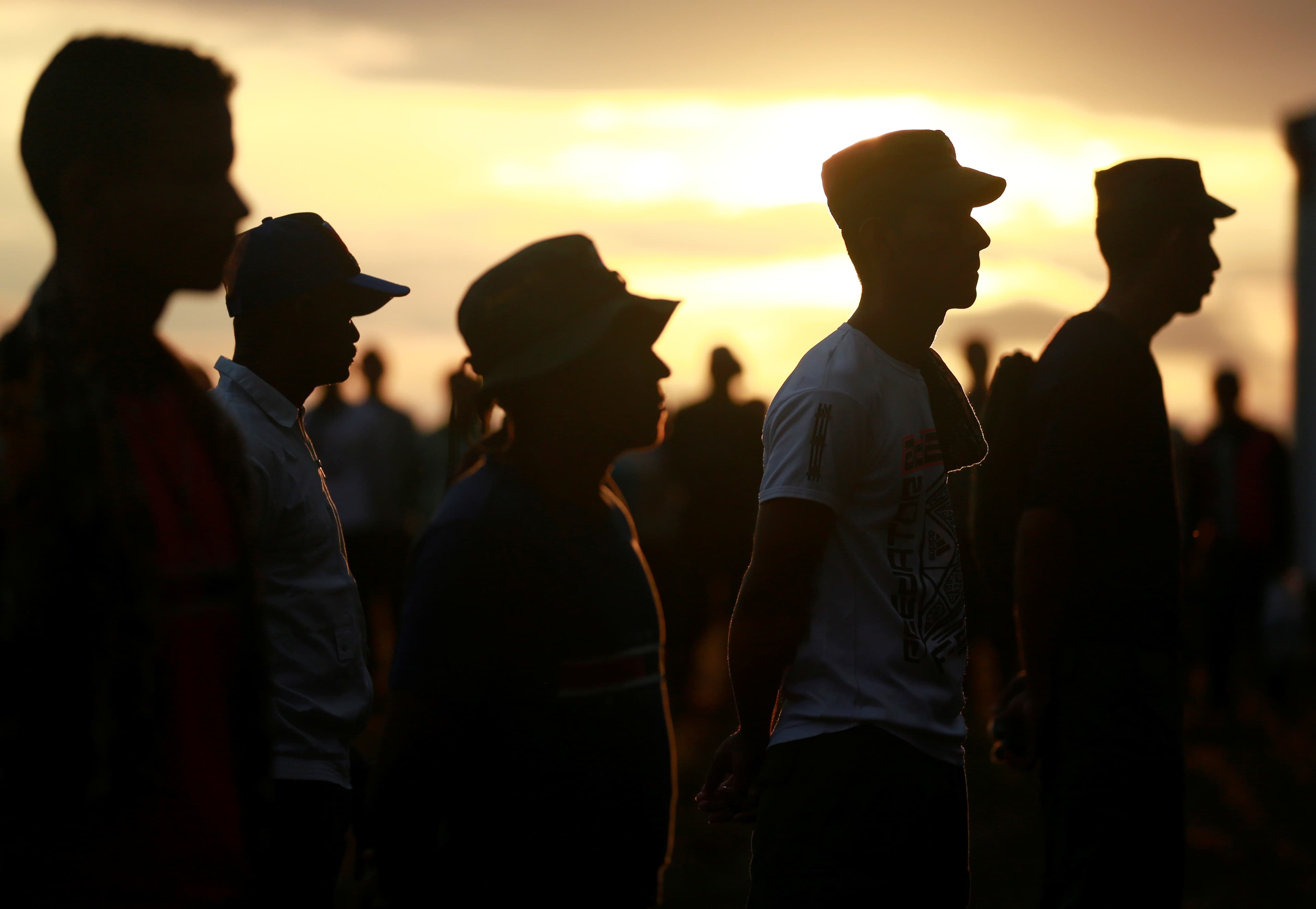 Fighters from Revolutionary Armed Forces of Colombia (FARC),stand in line during the opening of ceremony congress at the camp where they prepare for ratifying a peace deal with the government, near El Diamante in Yari Plains, Colombia, September 17, 2016.