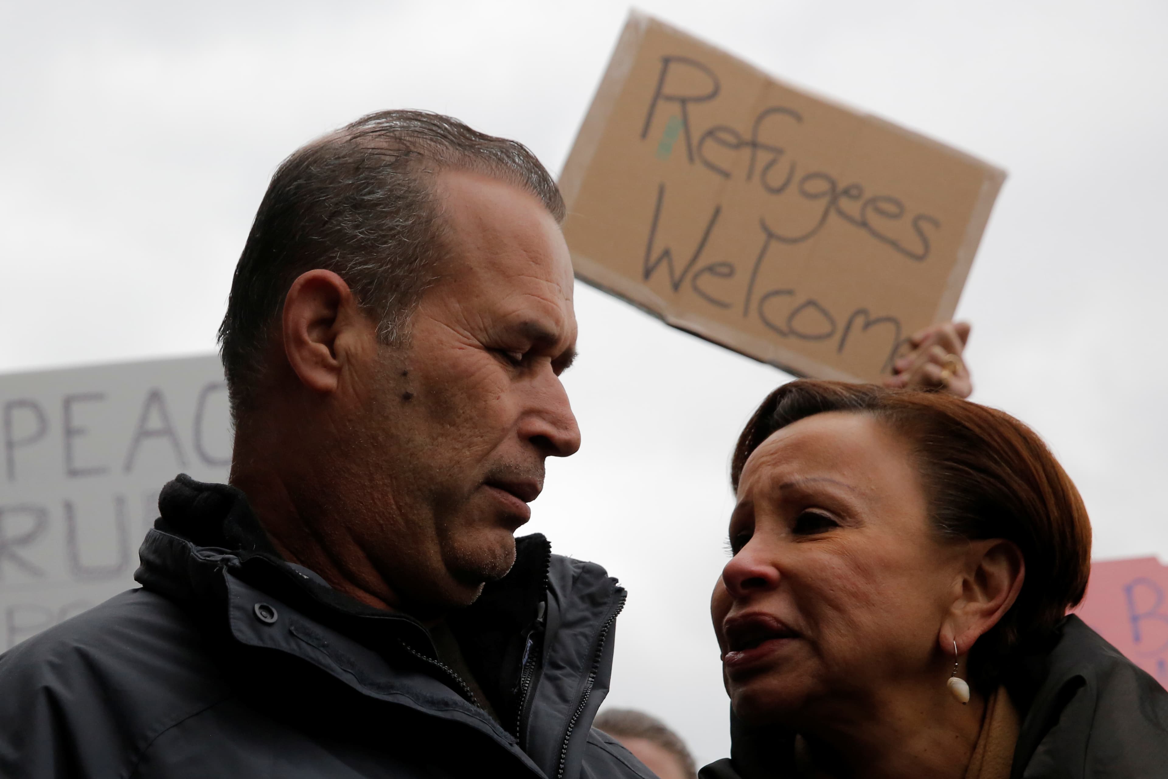 Man looking at woman