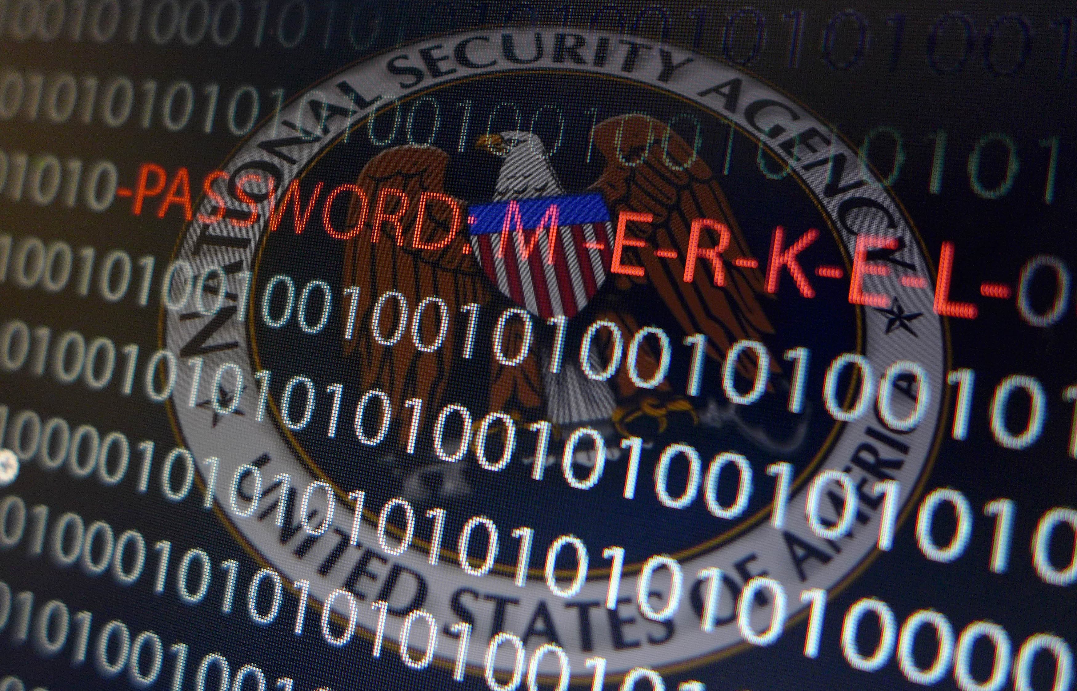 Computer with a series of numbers and logo of the United States' National Security Agency (NSA).