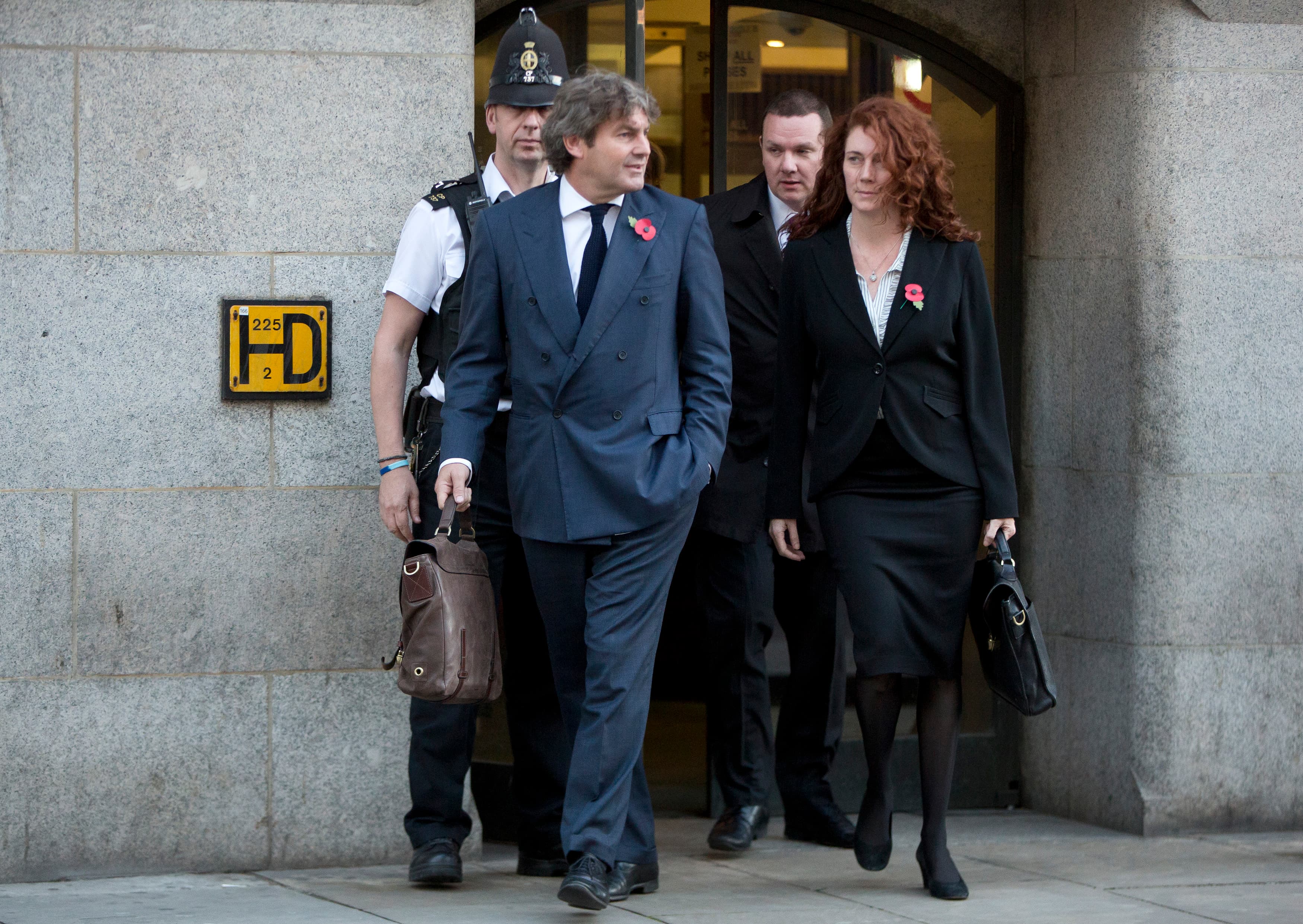Former News International chief executive Rebekah Brooks and her husband