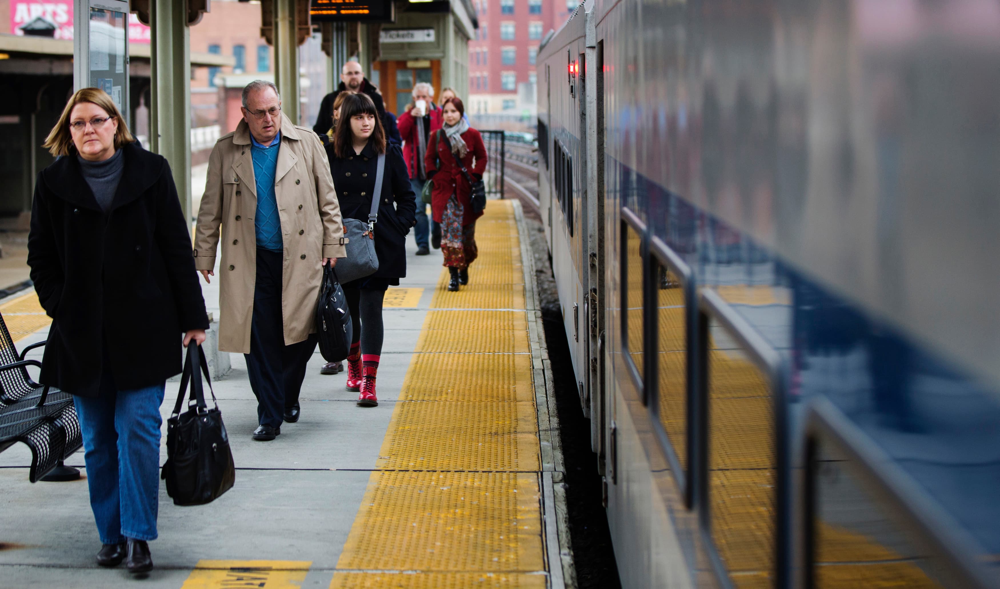 metro north passenger boarding train