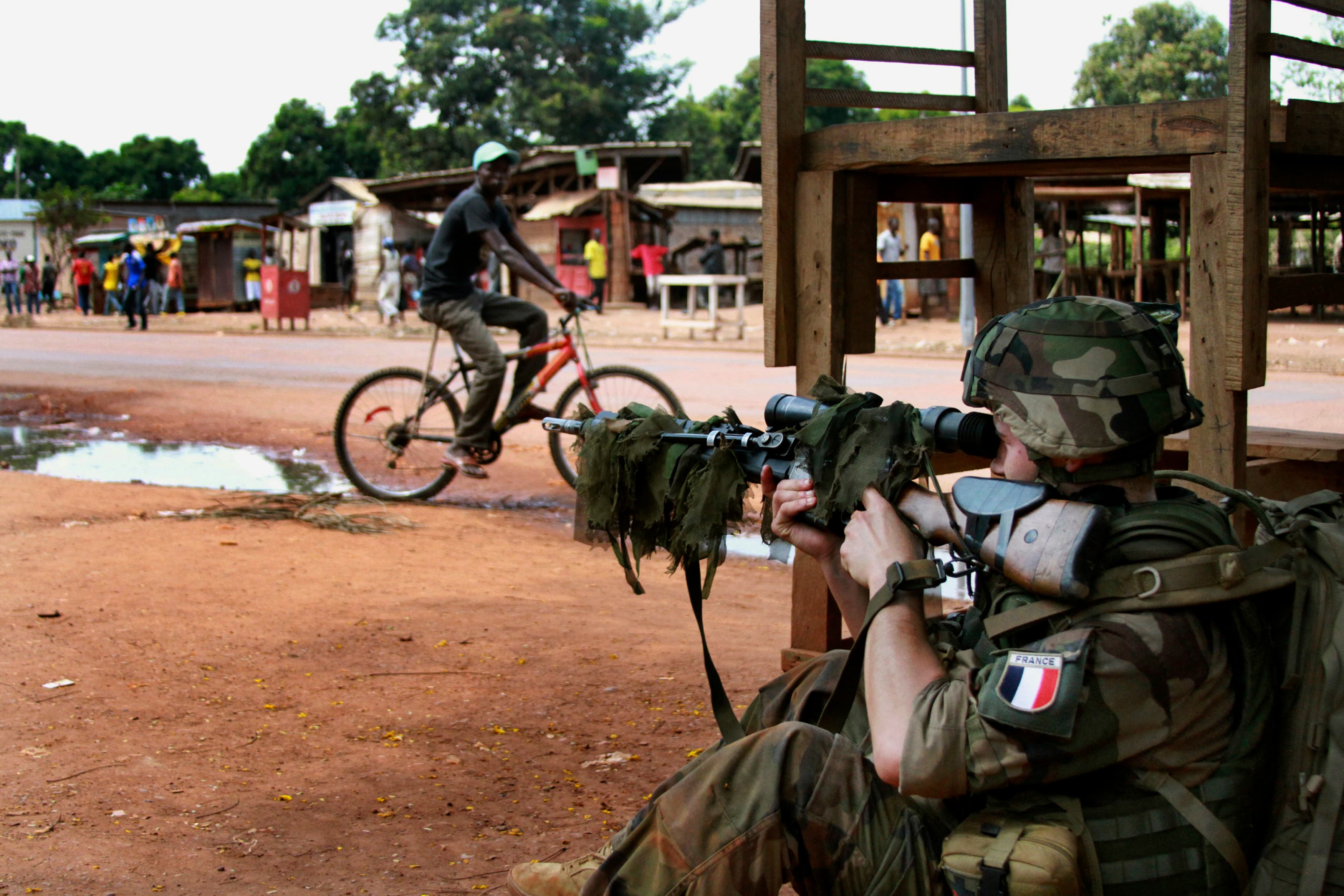A French military sniper readies his rifle in Bangui.