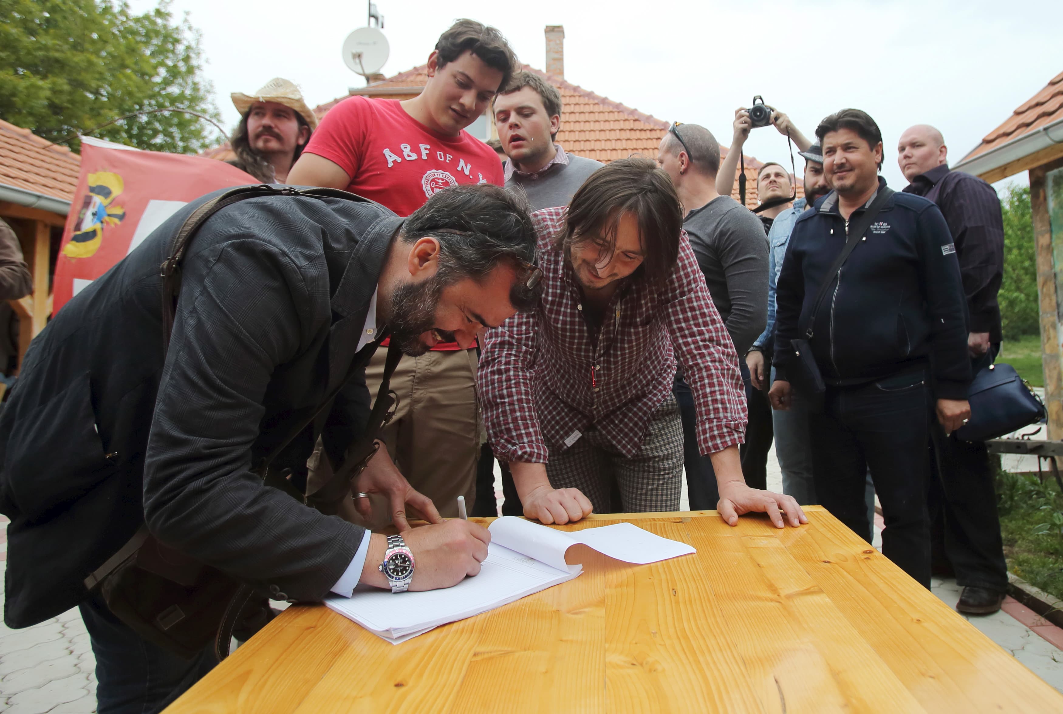 A man applies for Liberland citizenship in the village of Backi Monostor, Serbia May 1, 2015. A Czech citizen, Vit Jedlicka, has proclaimed a new sovereign state lying on the border between Croatia and Serbia.
