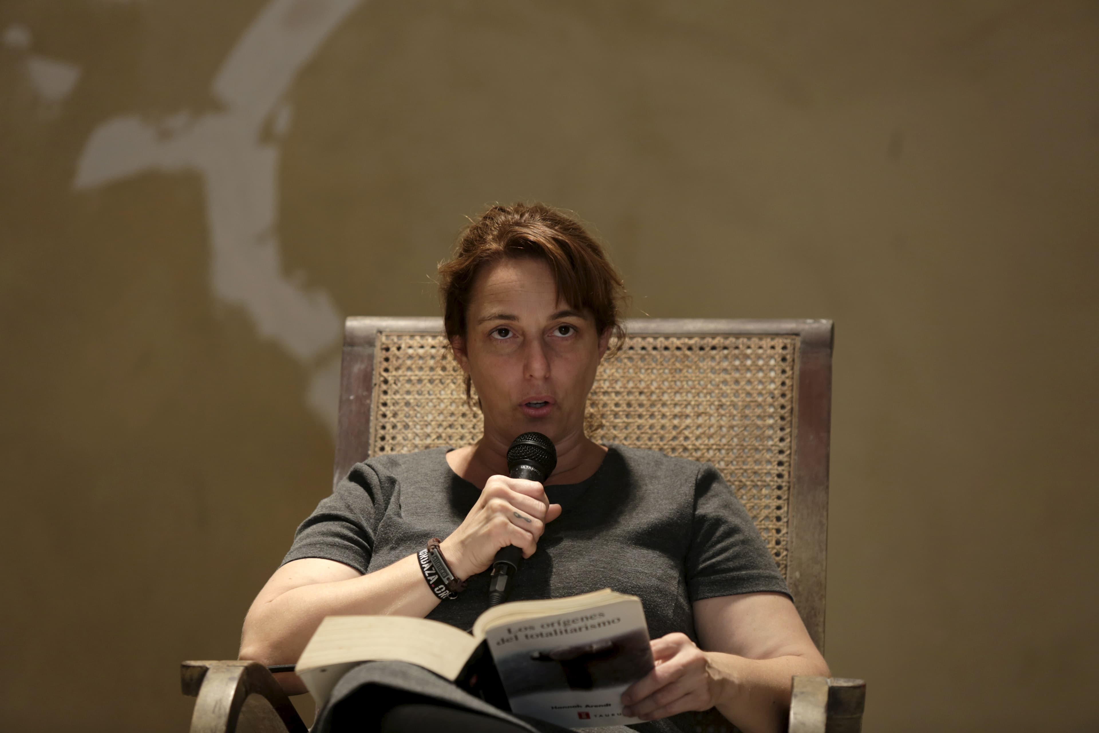 Cuban artist Tania Bruguera reads from Hannah Arendt's book "The Origins of Totalitarianism."