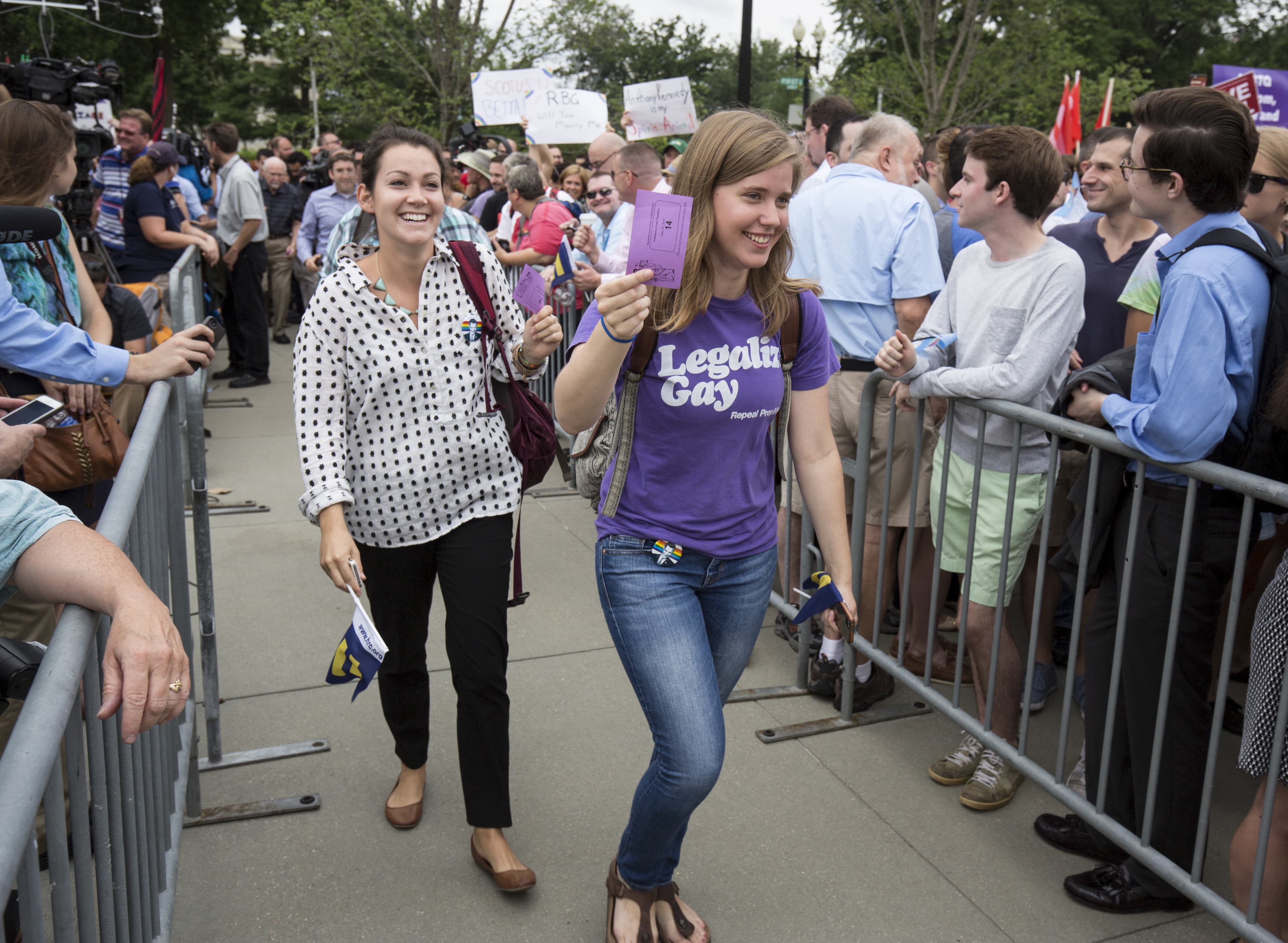 People show tickets on the way into the Supreme Court, gay rights