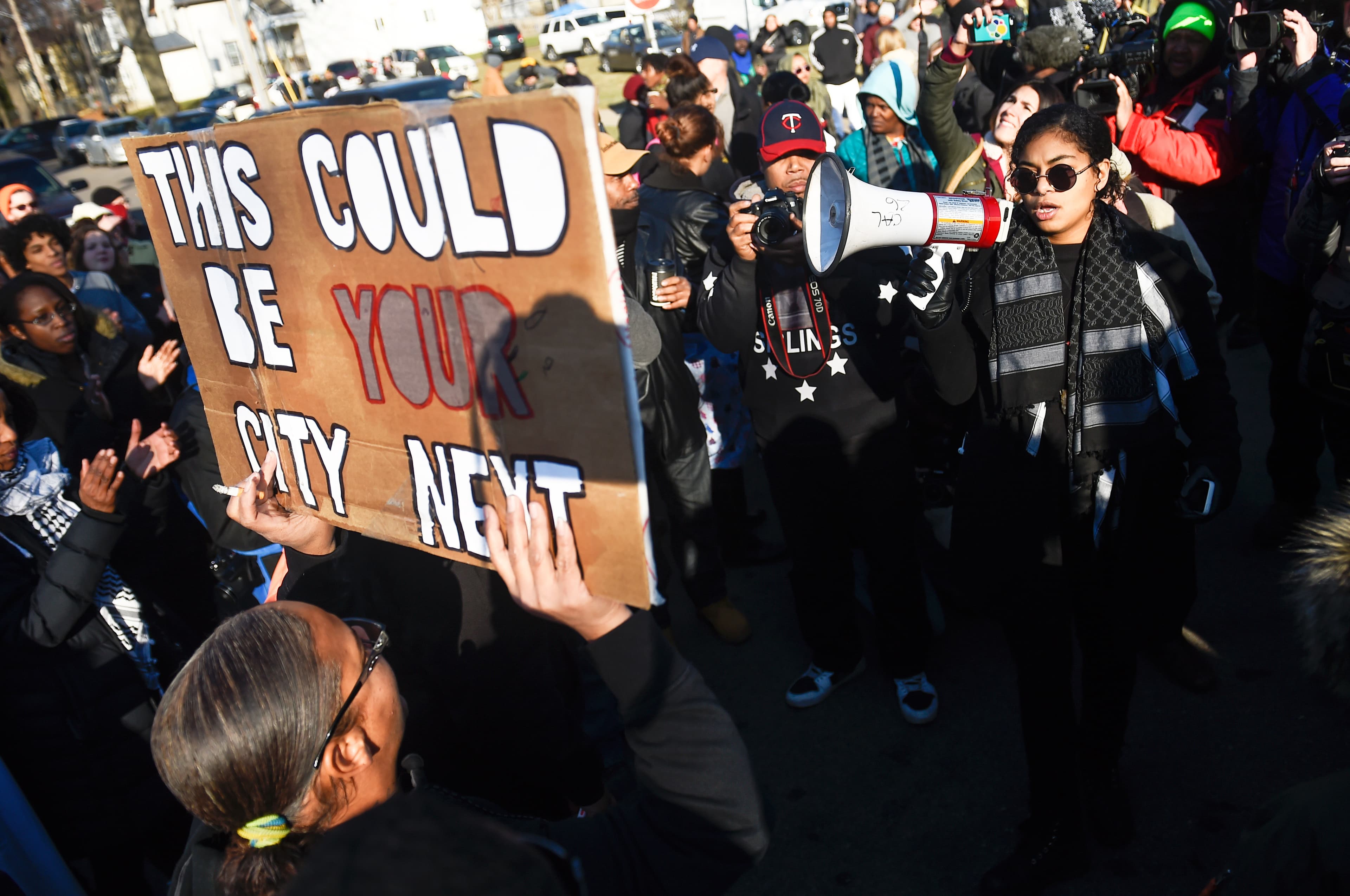 A gathering crowd of the group Black Lives Matter before they march to city hall during a protest in Minneapolis, Minnesota November 24, 2015.