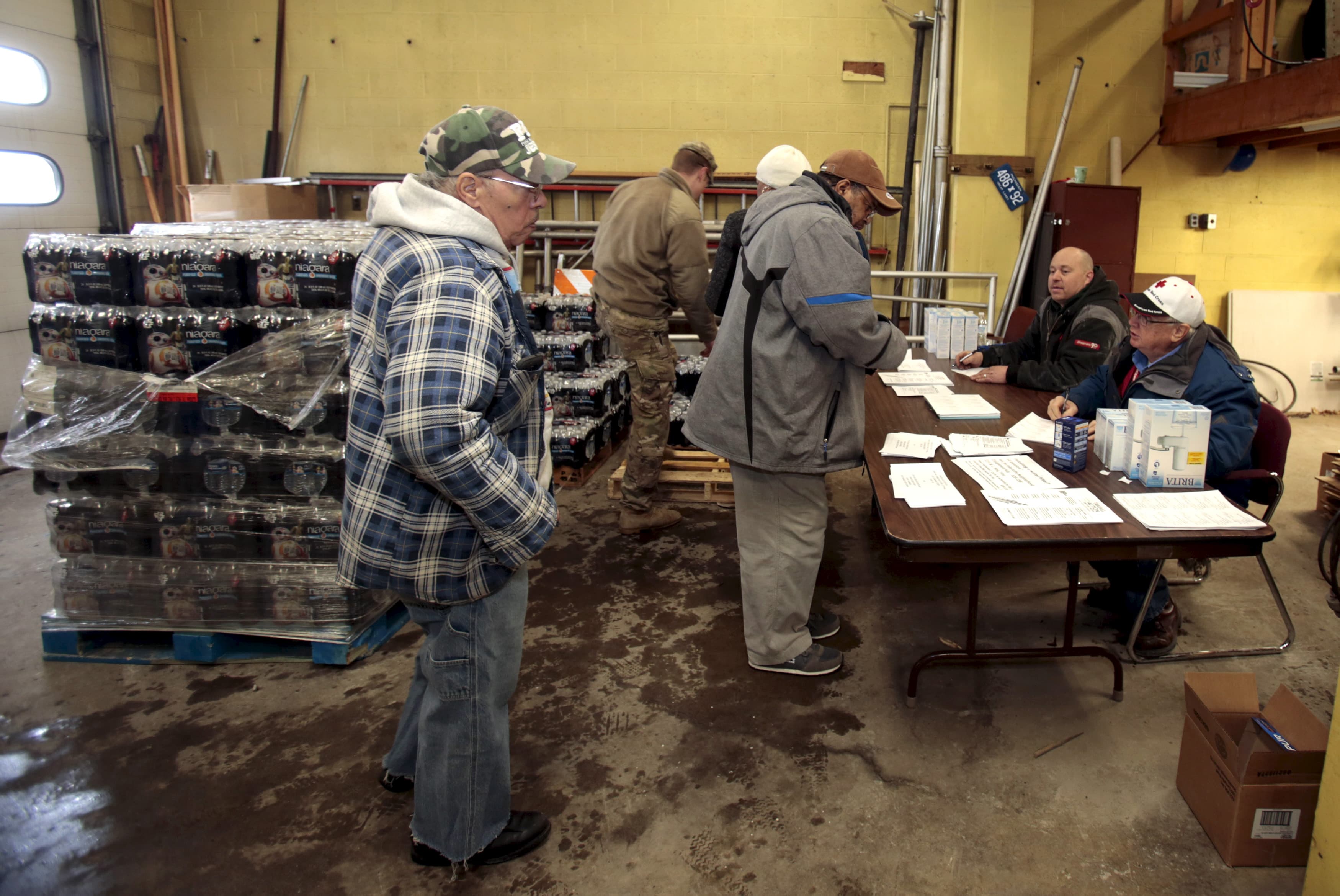 Flint residents receive bottled water and filters