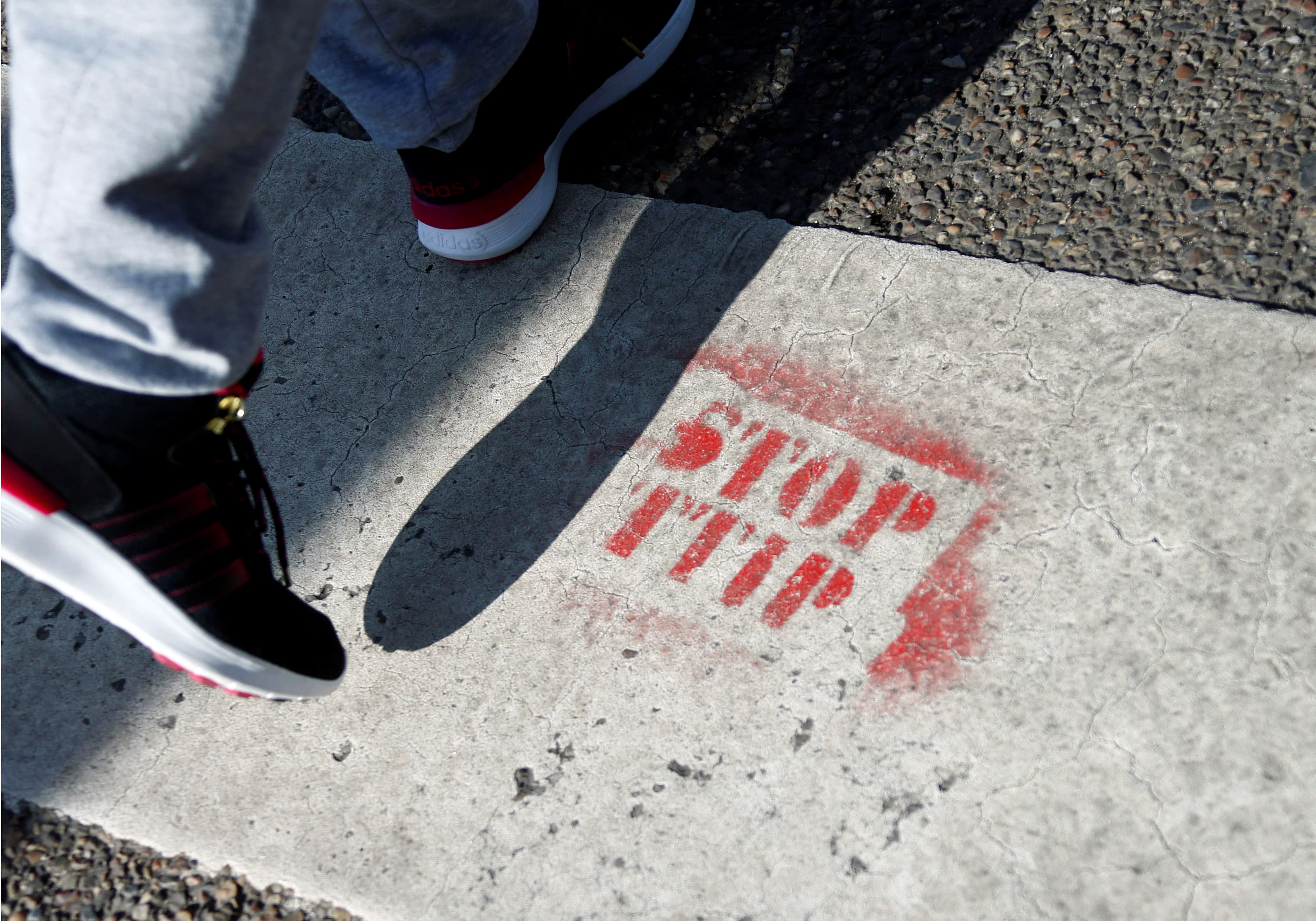 A spray painted sign against the Transatlantic Trade and Investment Partnership (TTIP) free trade agreement is pictured in Frankfurt, Germany, March 29, 2016.