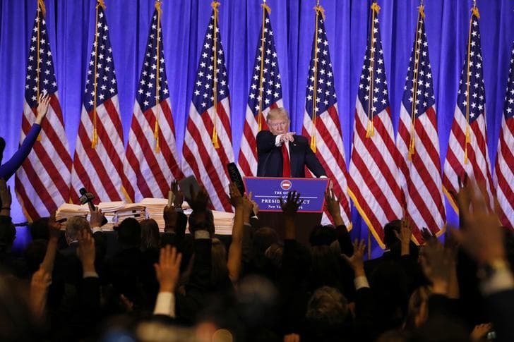 U.S. President-elect Donald Trump calls on reporters during a news conference in the lobby of Trump Tower in Manhattan, New York City, U.S., January 11, 2017.