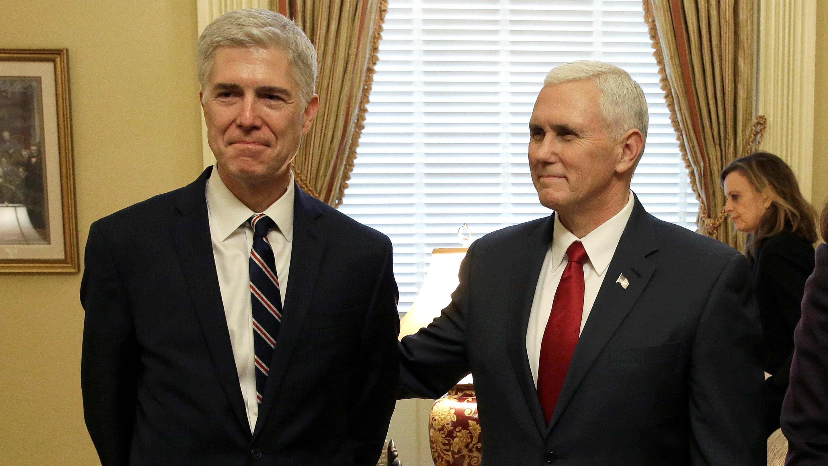 Supreme Court nominee Judge Neil Gorsuch stands with Vice President Mike Pence on Capitol Hill in Washington, DC, Feb. 1, 2017.