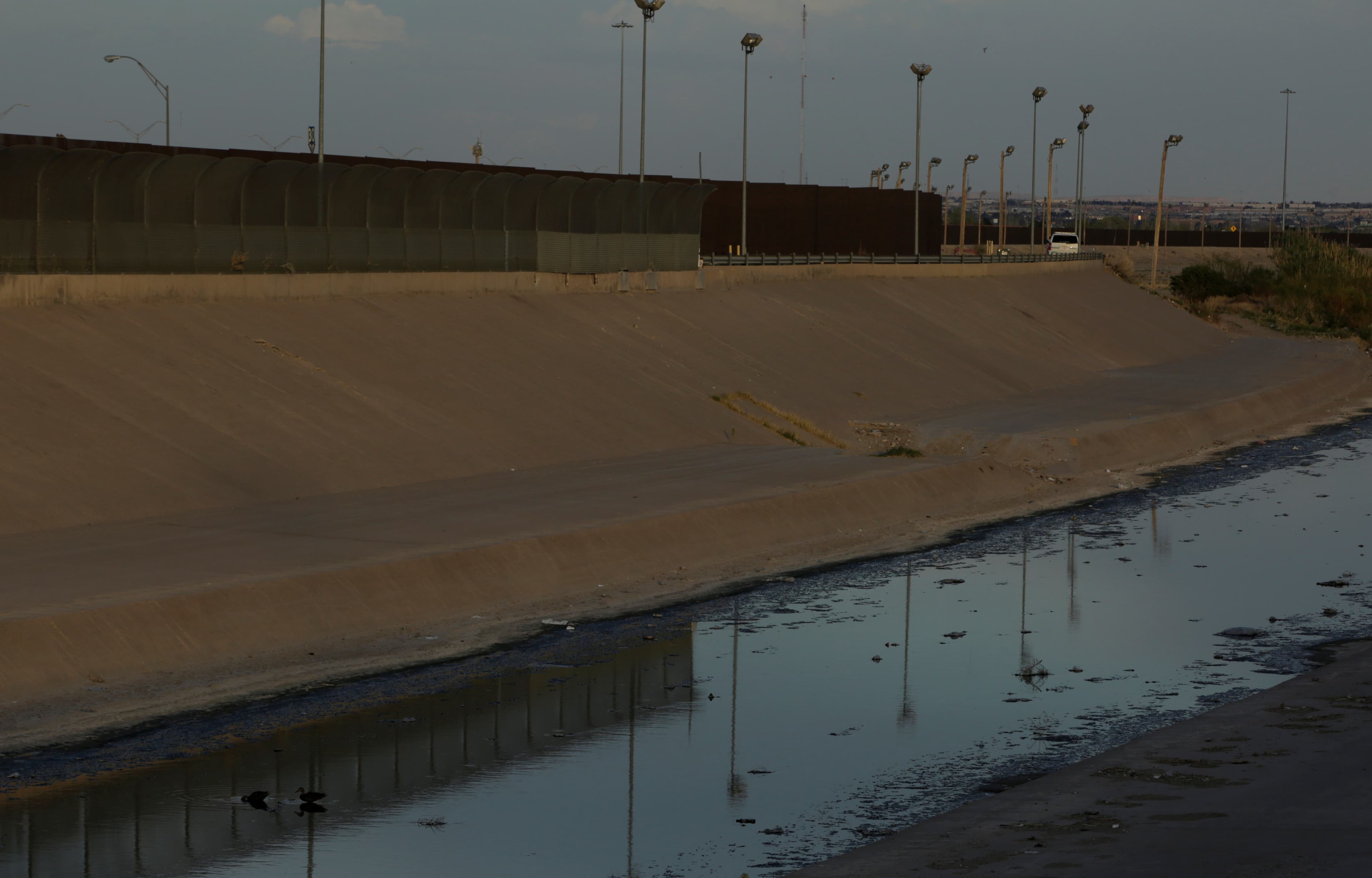 A view of a section of the U.S.-Mexico border fence is seen on the banks of the Rio Bravo, in Ciudad Juarez, Mexico March 11, 2017. Picture taken from the Mexico side of the Rio Bravo.