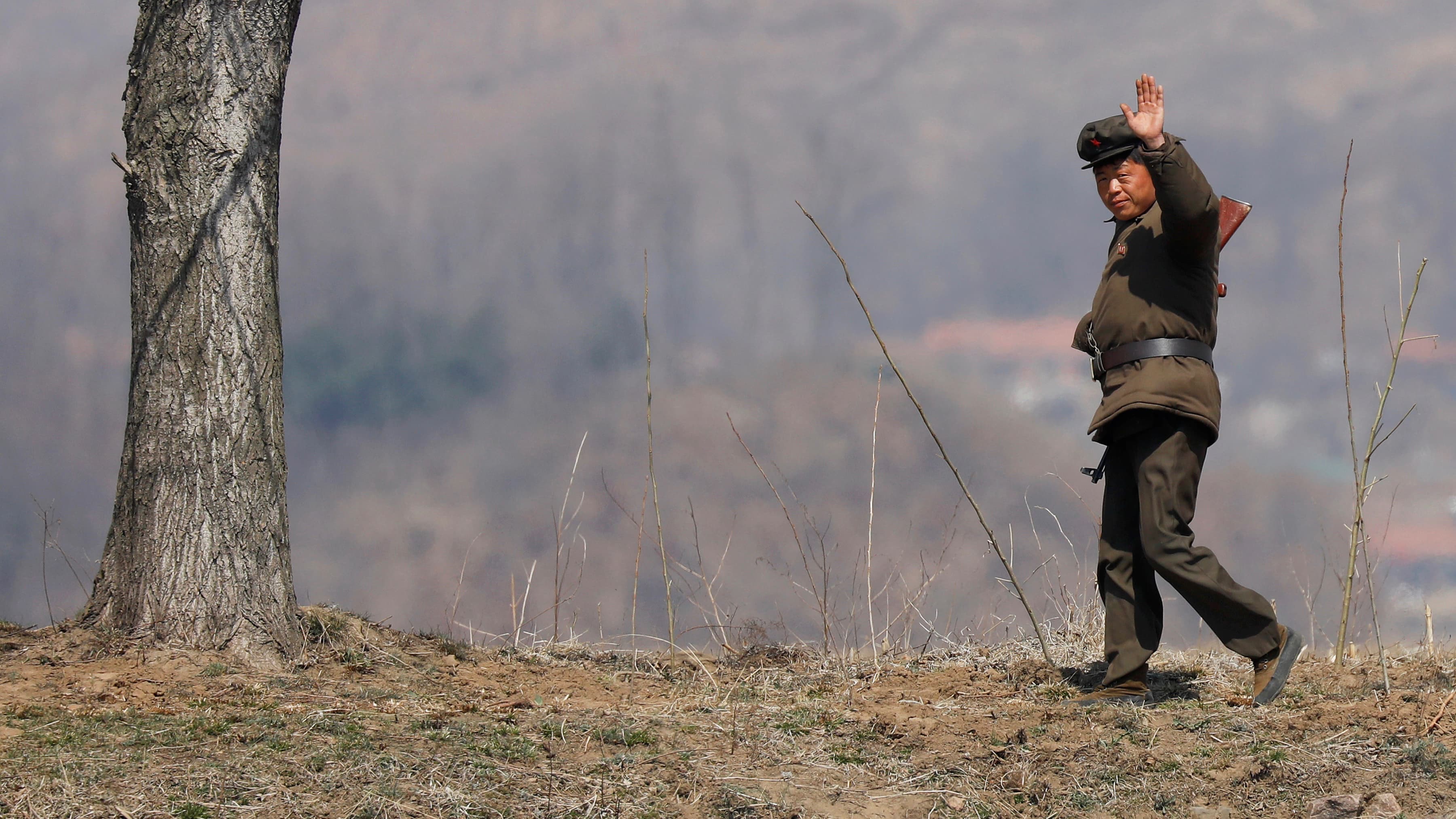 When many South Koreans look at North Korea, they just don’t see much to fear. Shown here, a North Korean soldier waves to tourists on a Chinese boat sailing the Yalu River near the North Korean town of Sinuiju, April 2, 2017.