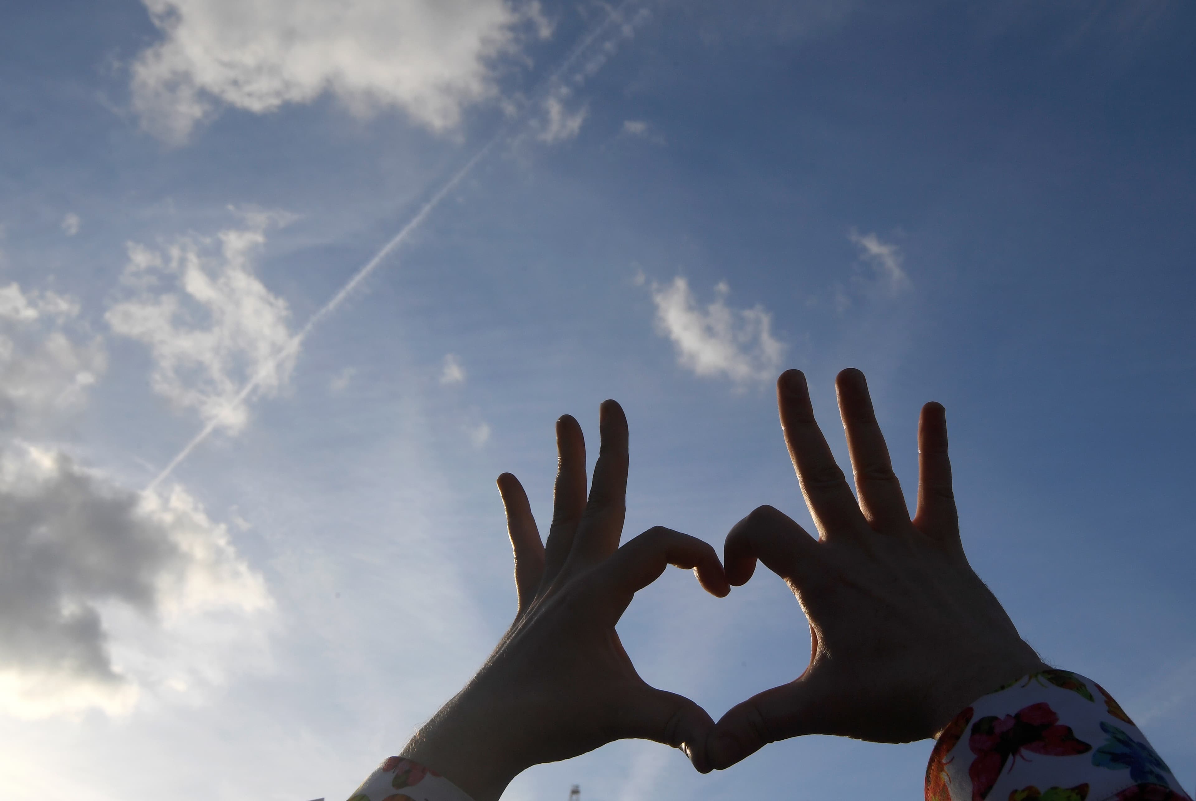 A woman in London's Trafalgar Square at a vigil for the victims of an attack on concert goers in Manchester Arena.