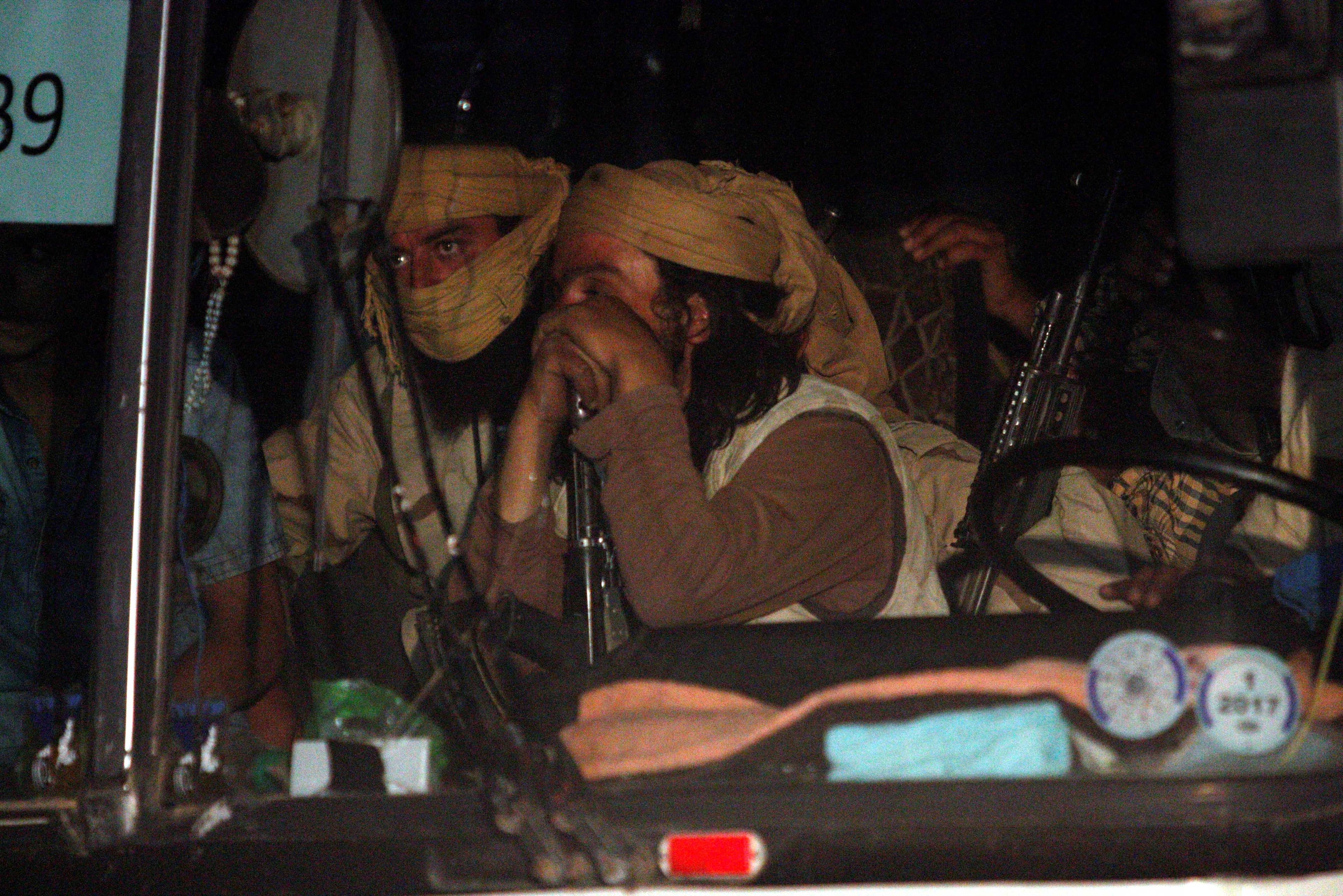 A convoy of ISIS fighters and their families begin to depart from the Lebanon-Syria border in Qalamoun, Syria, on Aug. 28, 2017.