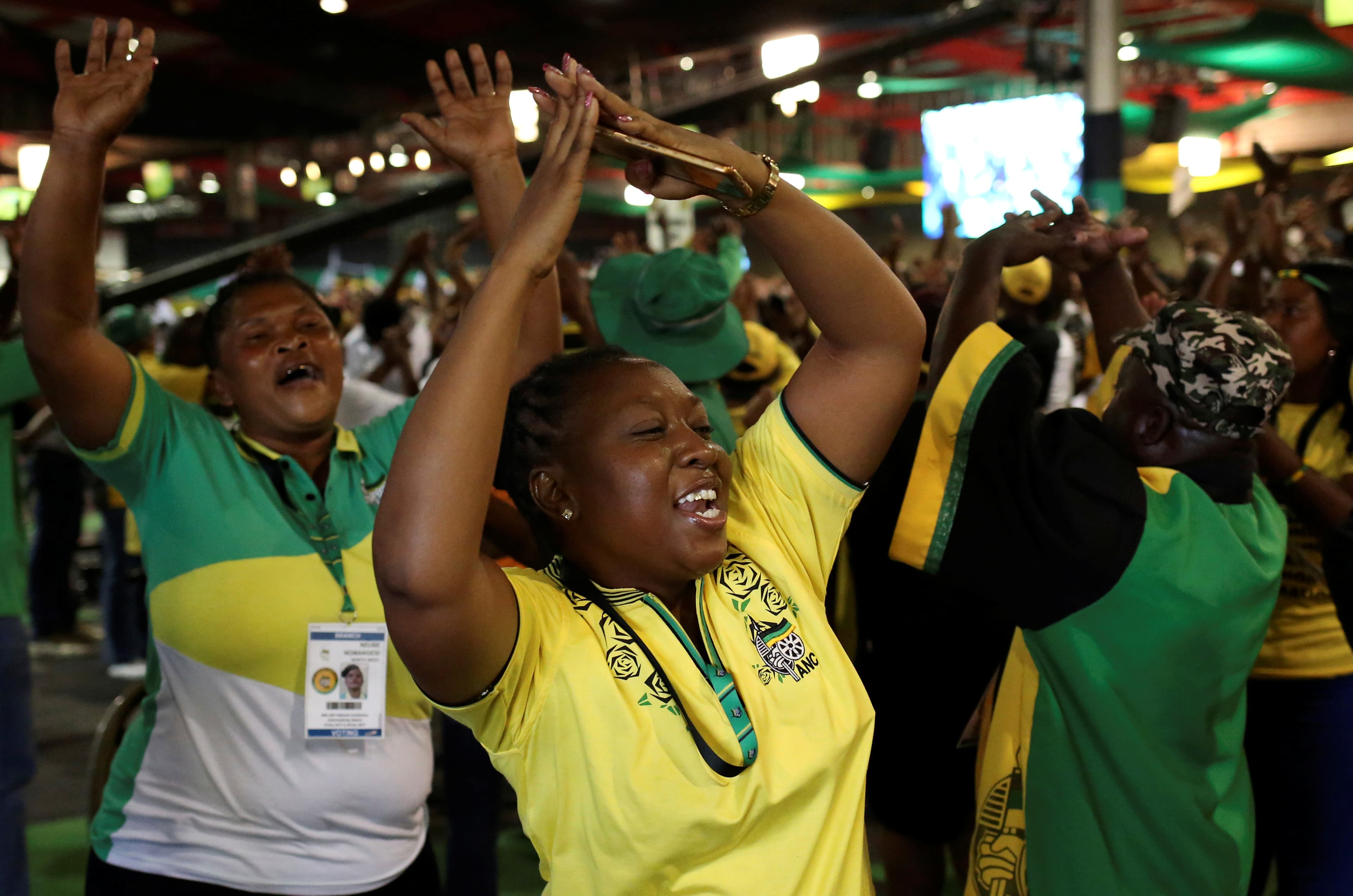 ANC members celebrate after Cyril Ramaphosa was elected president of the ANC in Johannesburg, South Africa.
