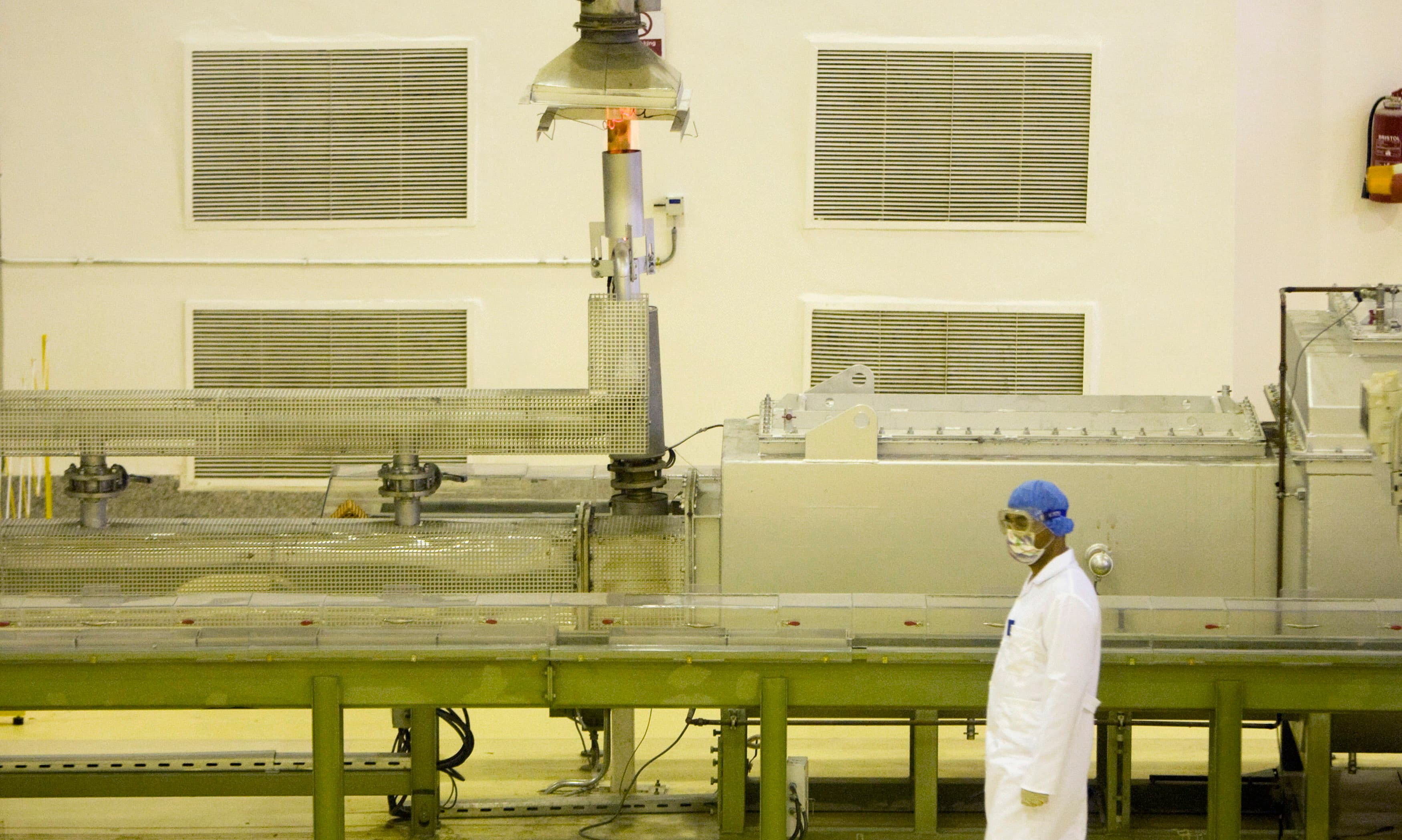 A worker works at the Fuel Manufacturing plant at the Isfahan Uranium Conversion Facility 440 km (273 miles) south of Tehran April 9, 2009.