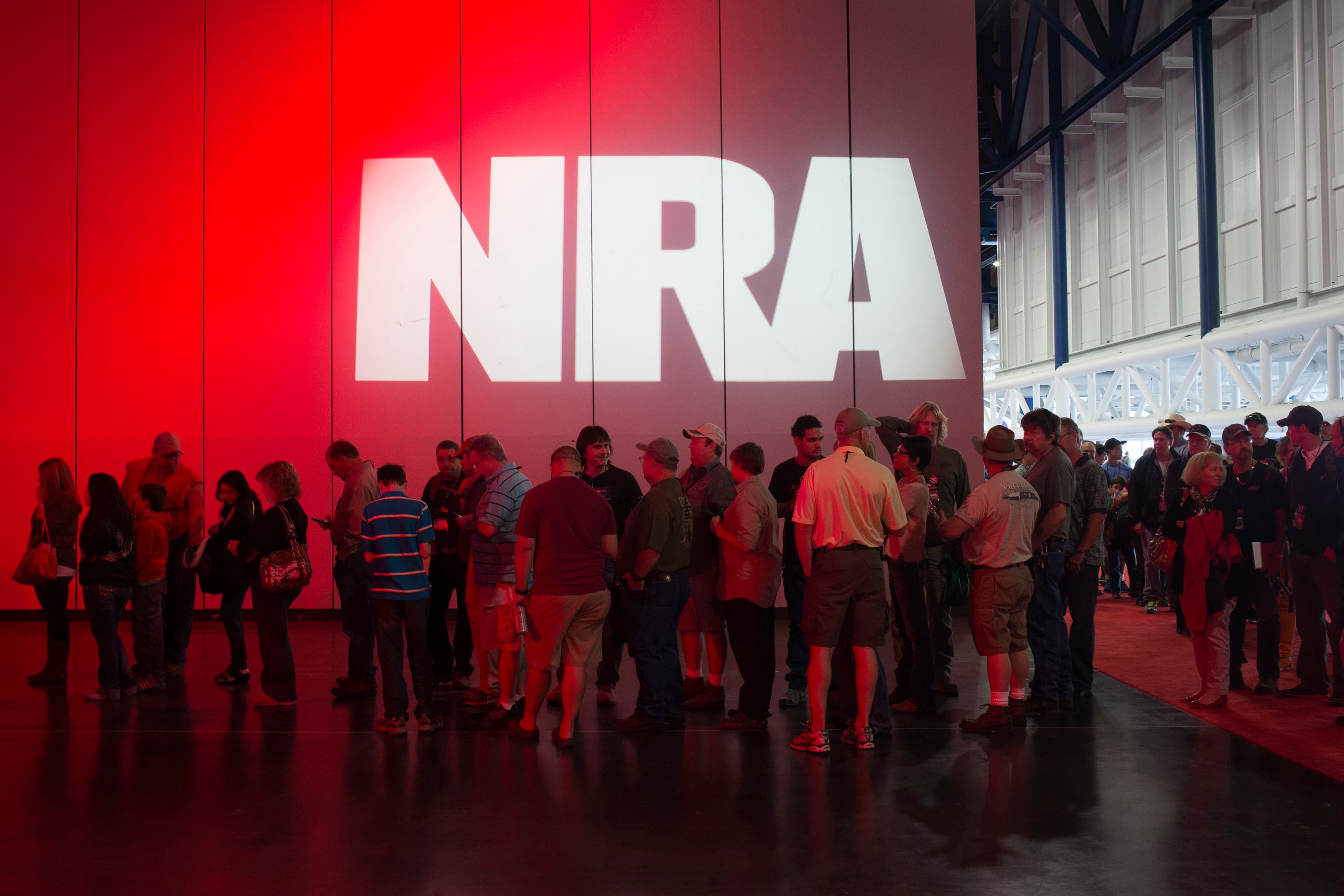Attendees line up to meet musician Ted Nugent at a book signing event during the National Rifle Association's annual meeting in Houston, Texas, on May 5, 2013.
