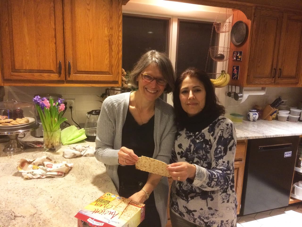 Mizgin, a Syrian refugee from Aleppo, and her family are living with Rachel Miller's family for the year.