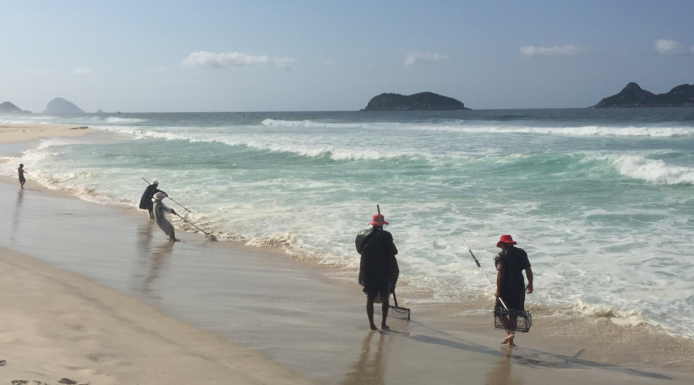 Rio, Brazil beach treasure hunters