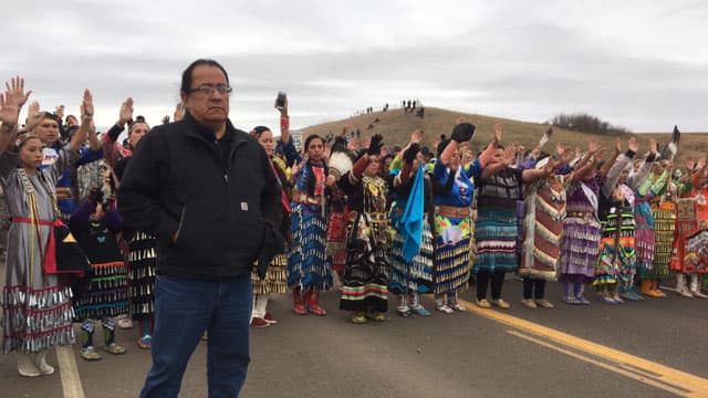 Demonstrators against the Dakota Access oil pipeline block a road near North Dakota's Standing Rock Reservation in October. The pipeline would cross historic Native land and pass under the Missouri River, the source of the local water supply.