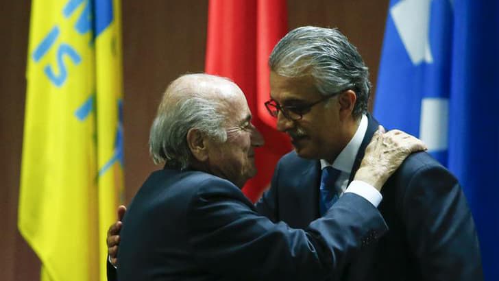 Executive Committee member Salman Bin Ebrahim Al Khalifa (R) congratulates FIFA President Sepp Blatter after he was re-elected at the FIFA Congress in Zurich, Switzerland, May 29, 2015.