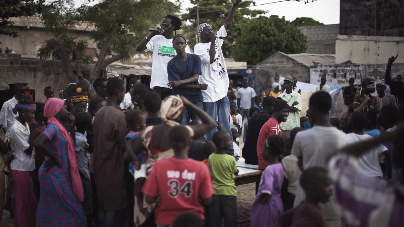 Members of the hip-hop group Y'en a marre perform during a community concert in the Dalifort neighbourhood of Senegal's capital Dakar, June 18, 2011.