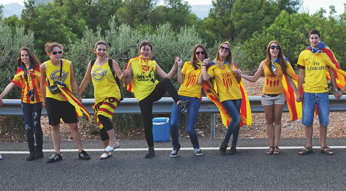 Catalans who want to separate from Spain join hands as part of a human chain across Catalonia on Sept. 11, 2013.