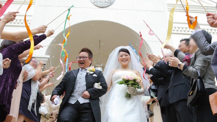 An LGBT couple in Japan celebrate their nuptials.