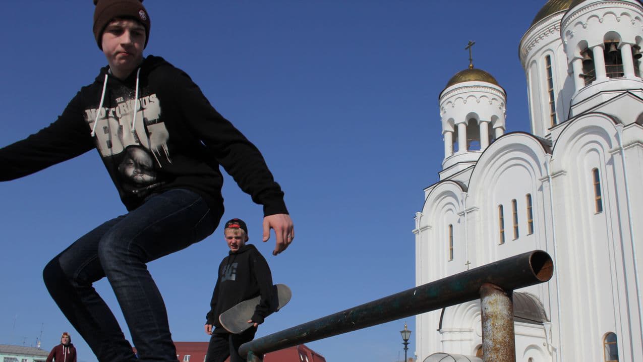 Russian skateboarders in Serov's central square. "I've got nothing against America," one of them says. "They've got some great skaters in the US."