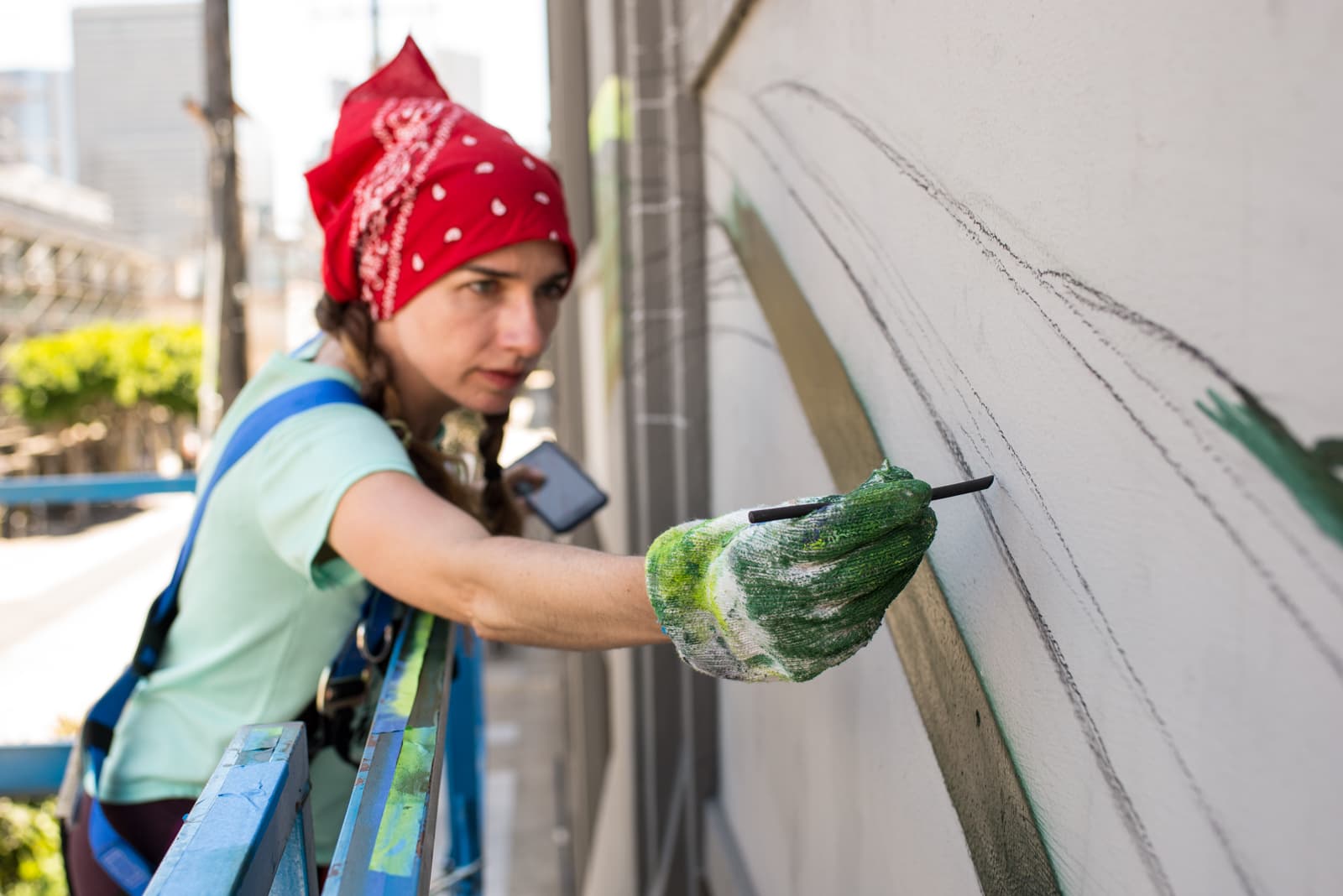 Mona Caron painting in San Francisco