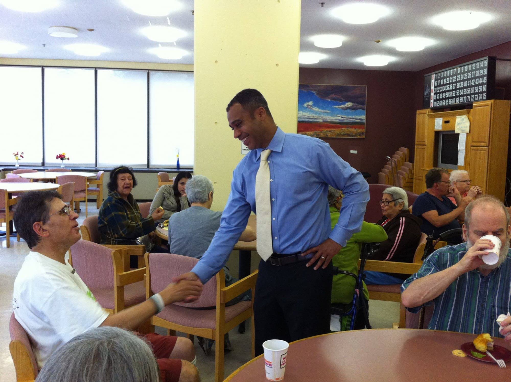 Dennis Benzan meeting constituents