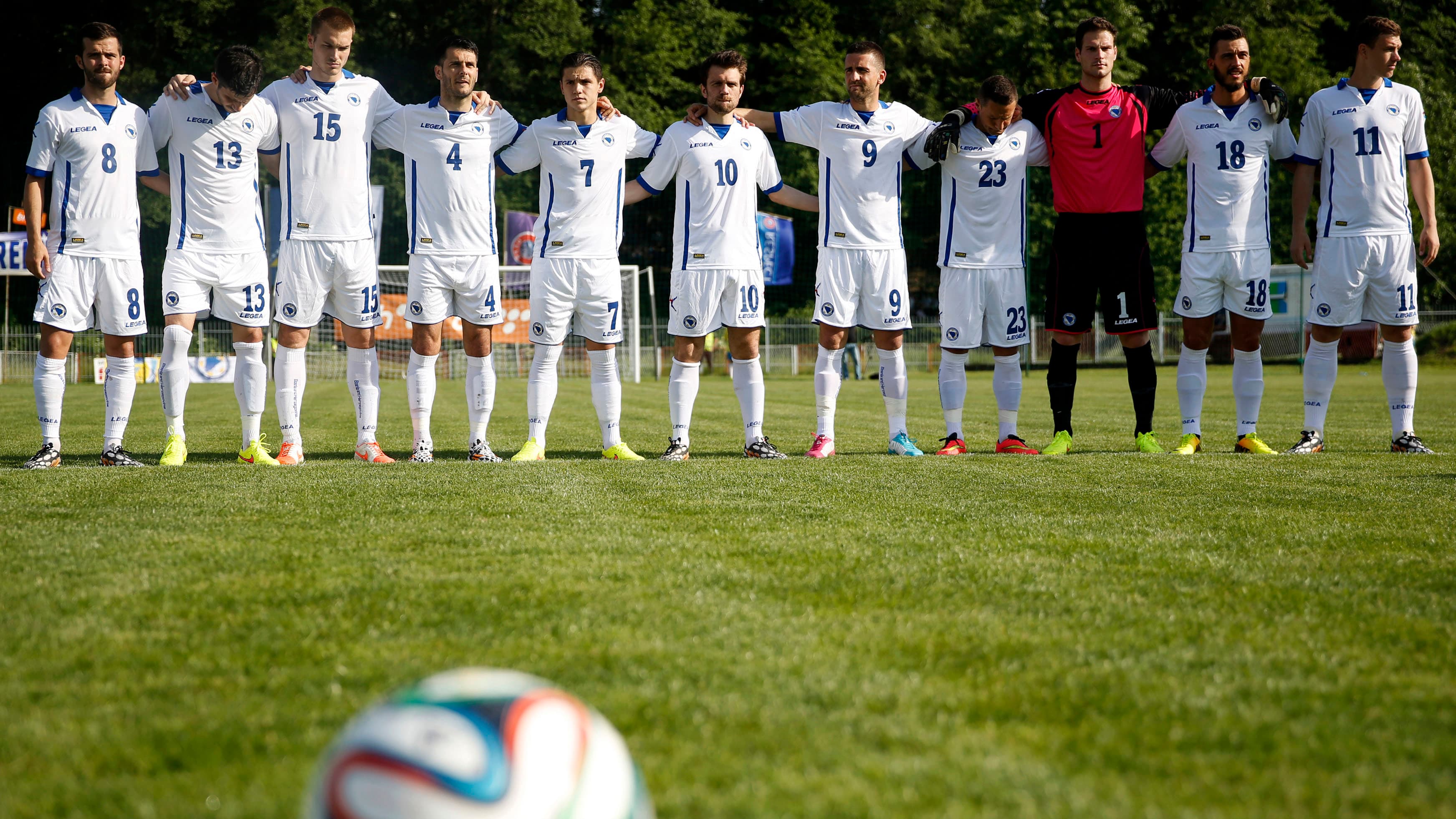 Bosnia's national soccer team players (L-R) Miralem Pjanic, Jasmin Mujdza, Toni Sunjic, Emir Spahic, Tino-Sven Susic, Zvjezdan Misimovic, Vedad Ibisevic, Sejad Salihovic, Asmir Begovic, Haris Medunjanin and Edin Dzeko