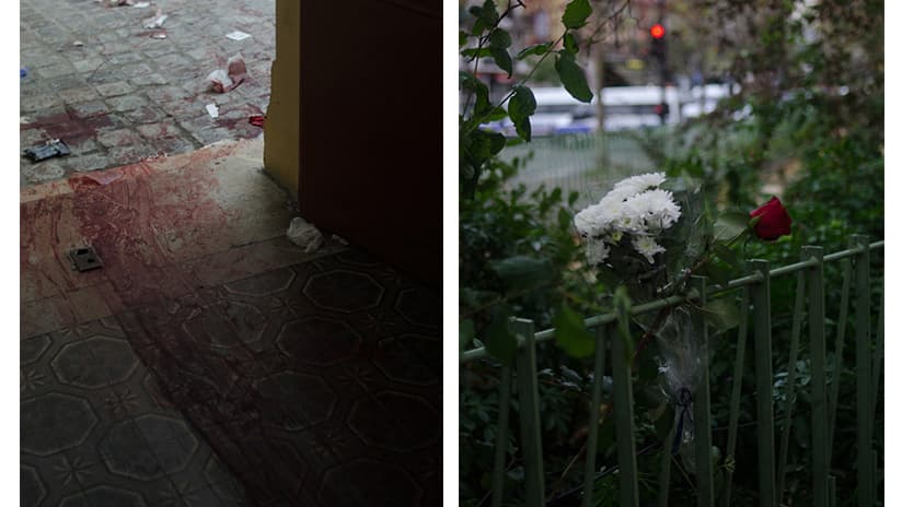 Wreaths and flowers line the fences around the Bataclan concert hall in Paris Saturday morning, where streets and courtyards became triage centers for victims after the attacks on Friday night.