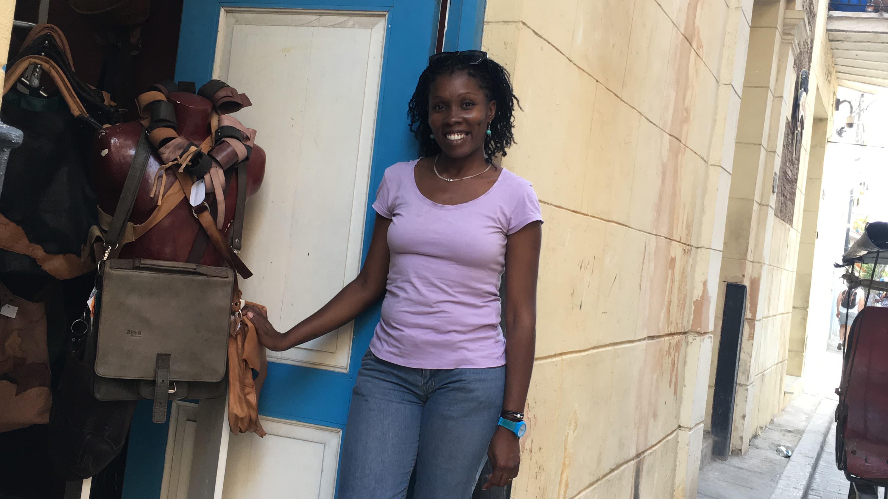 Small business owner Mady Zulueta outside her store, Zulu, in a prime area of Old Havana, Cuba.