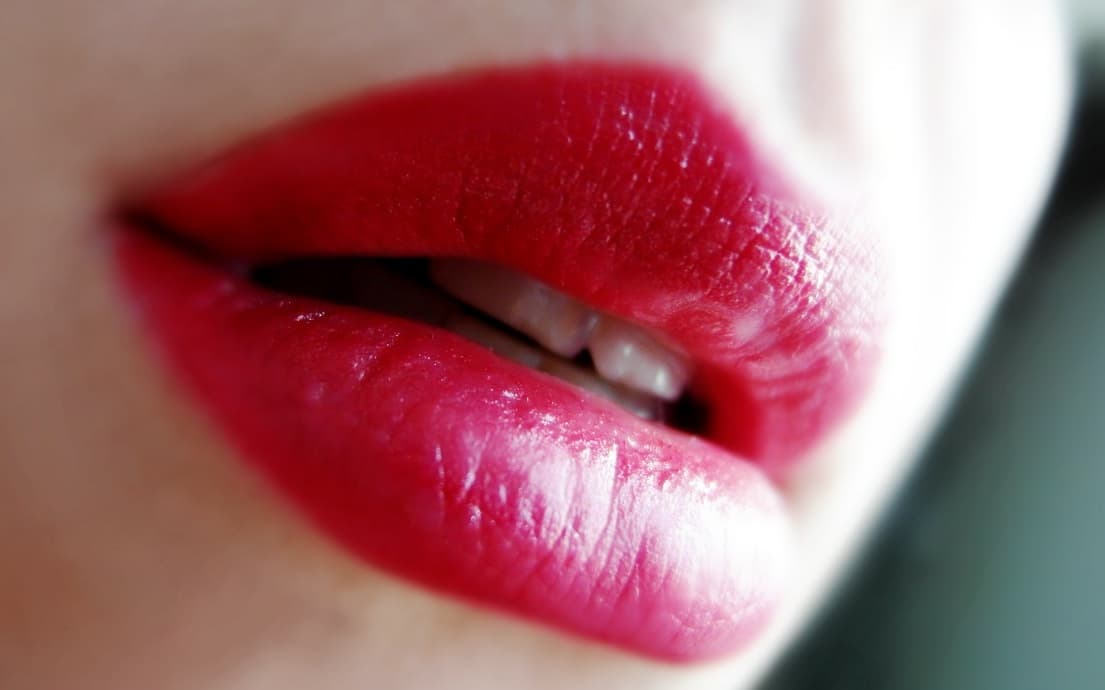 Red lipstick on lips