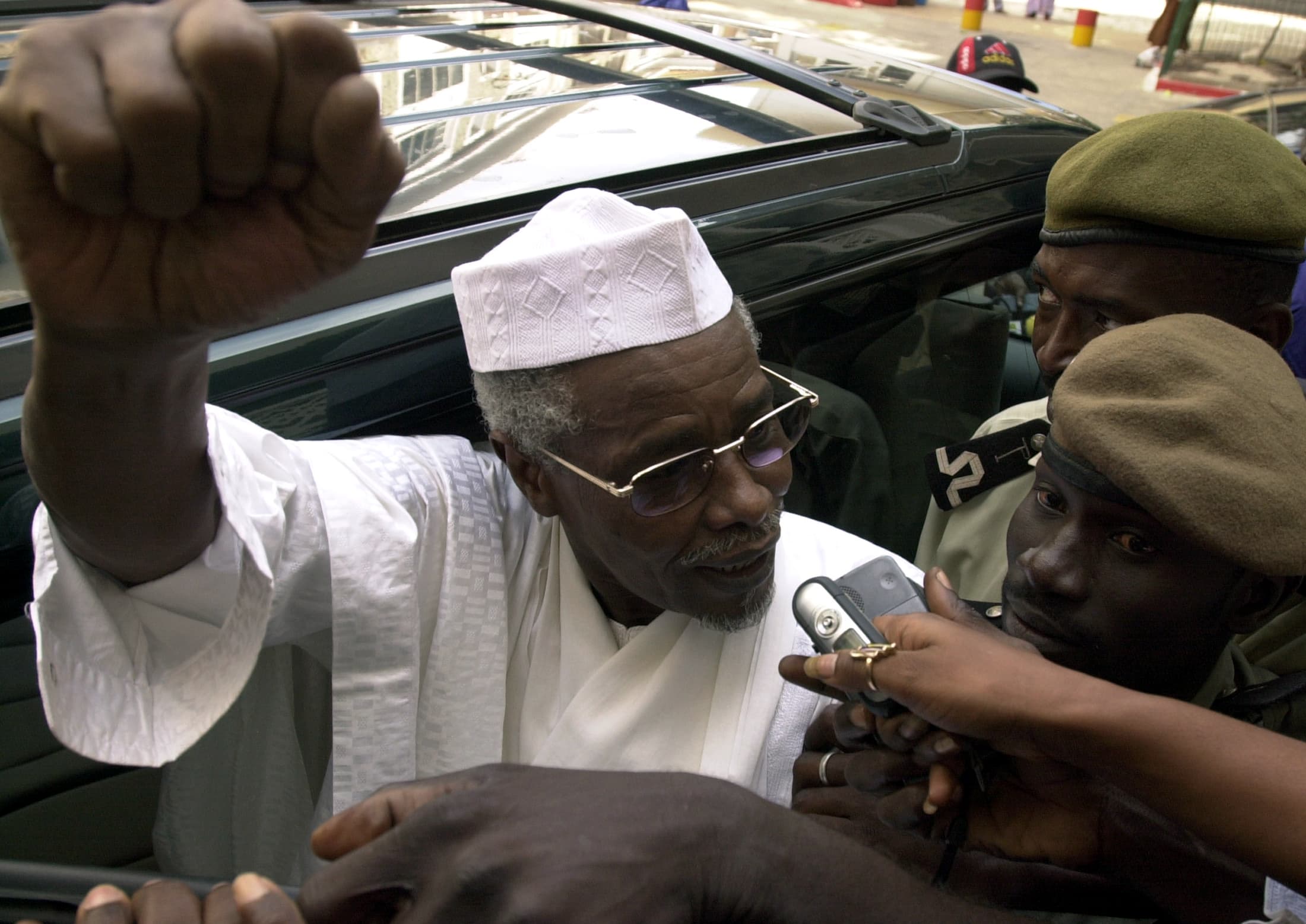 Former Chad President Hissene Habre makes declarations to media as he leaves a court in Dakar, 2005.