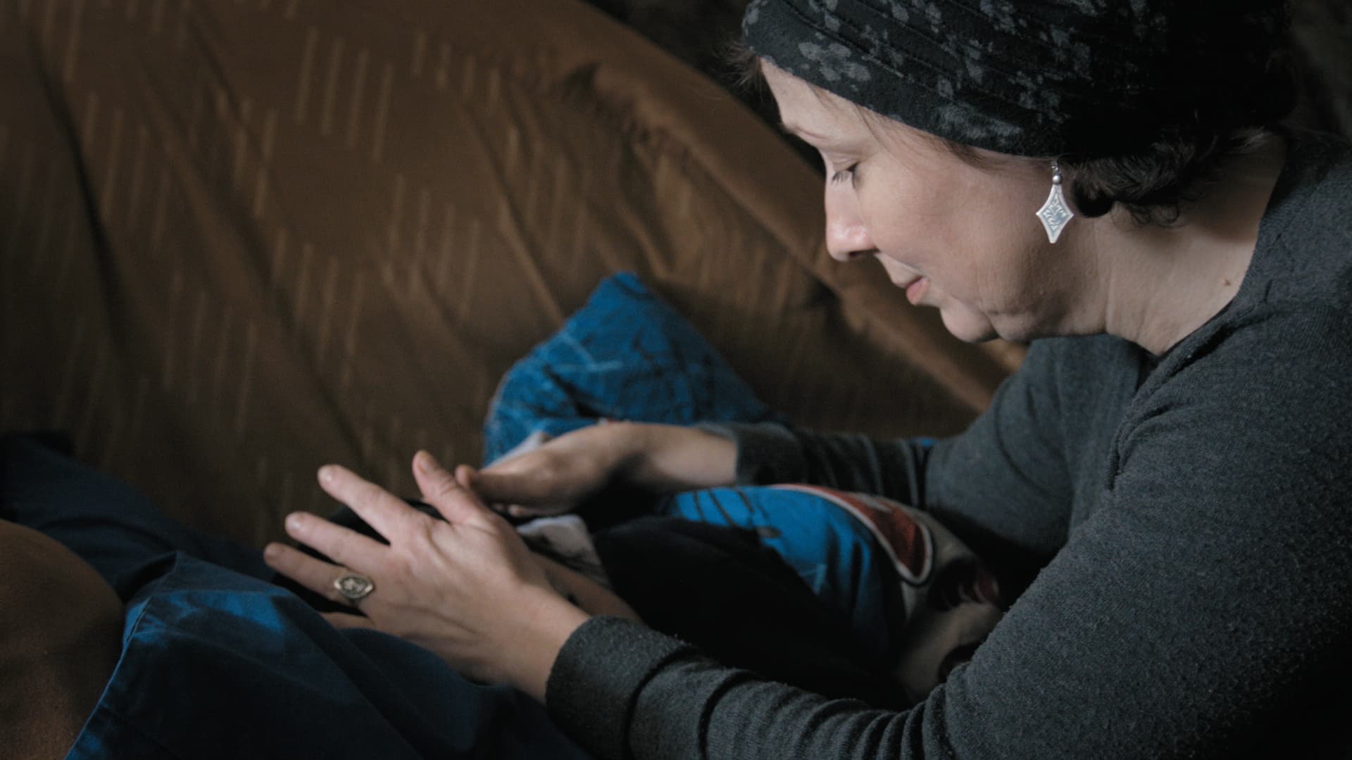 Yigal Amir's wife, Larisa Trimbovler, with their son, Yinon from the documentary, Beyond the Fear. Amir got married and fathered a son after he went to prison for the assassination of Yitzhak Rabin.