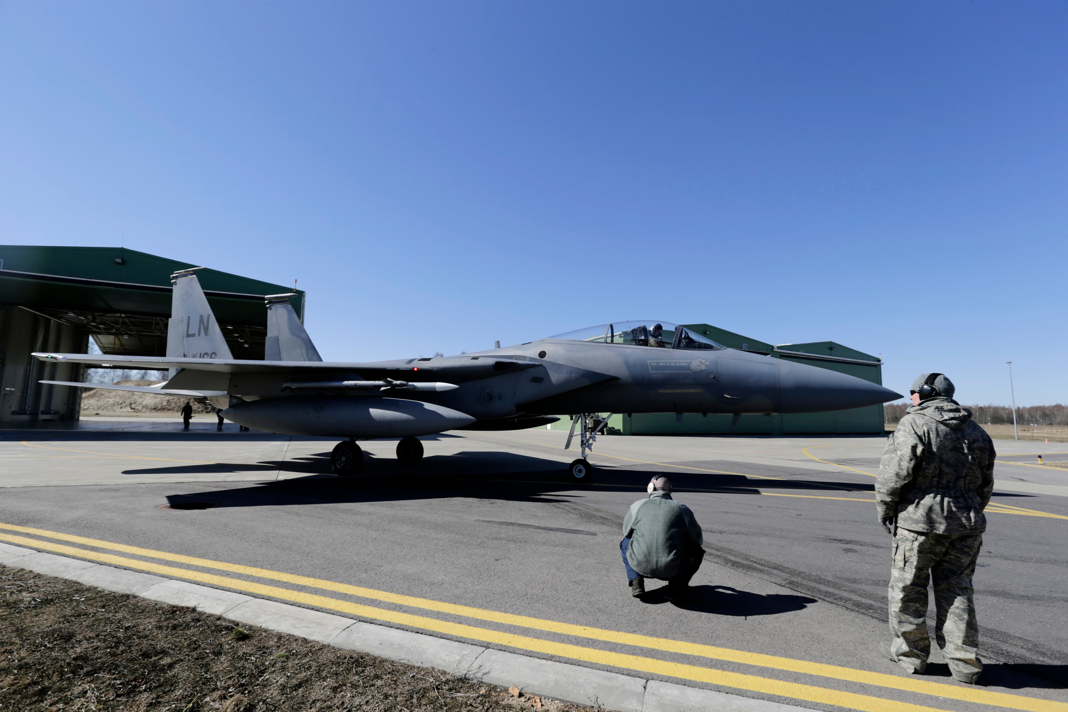 A US Air Force F-15 fighter moves onto the ramp to take part in a patrol during a joint NATO military exercise in Lithuania earlier this year.